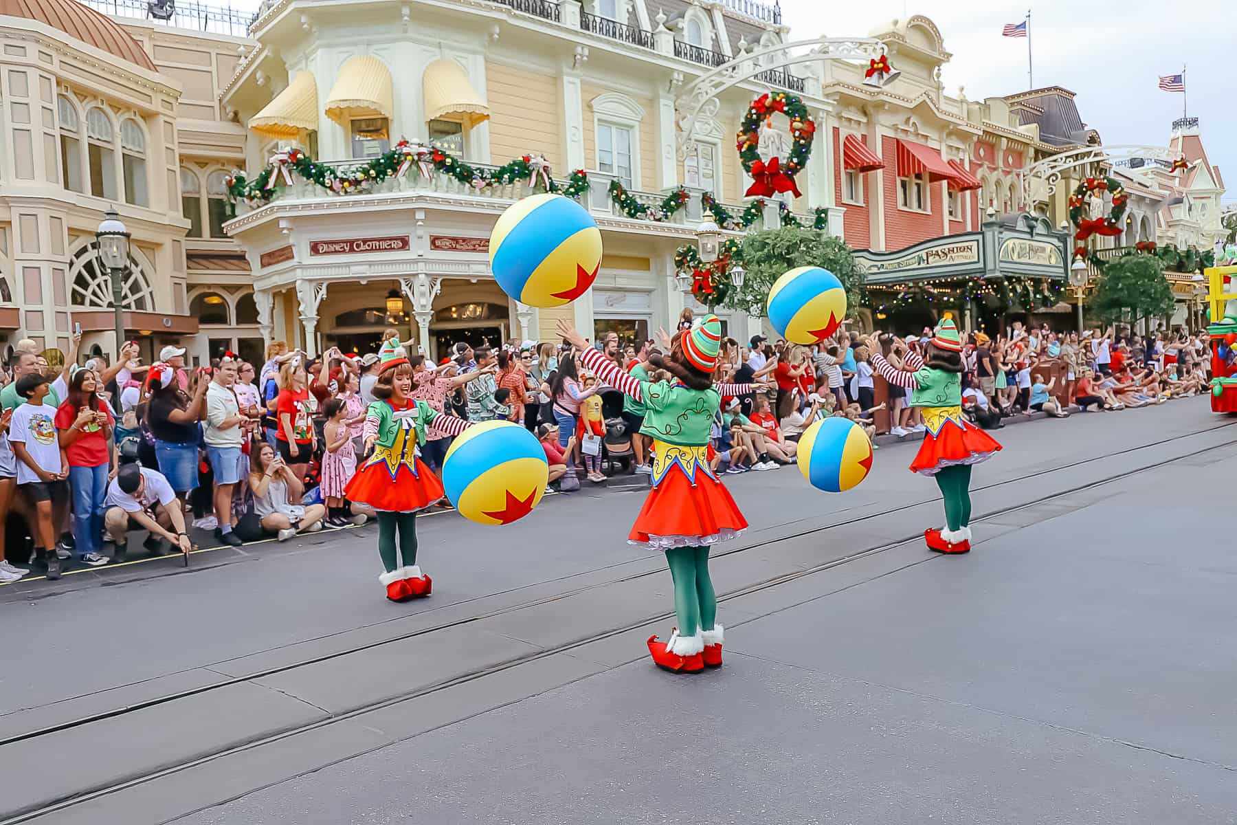 Christmas elves bouncing the balls along the parade route. 