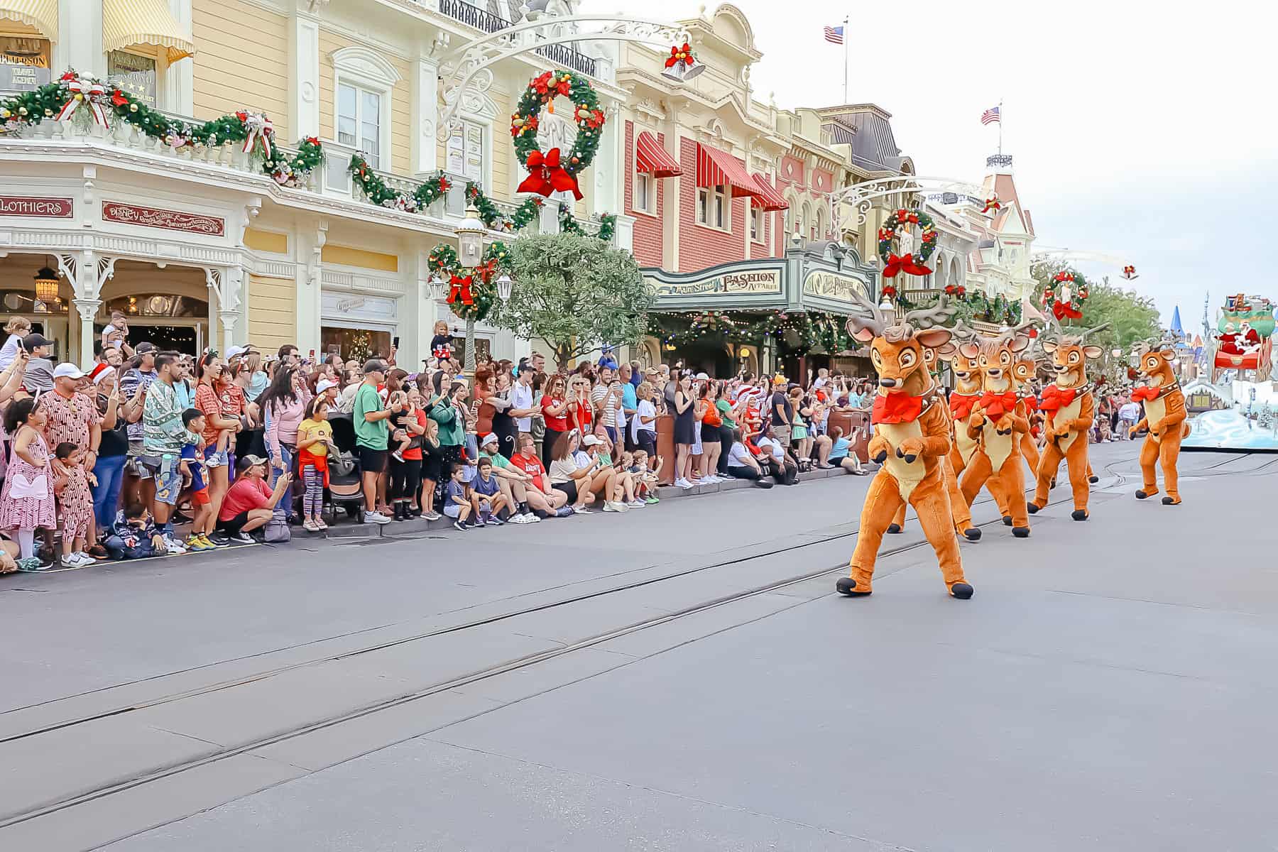 Santa's reindeer prance down Main Street, USA. 