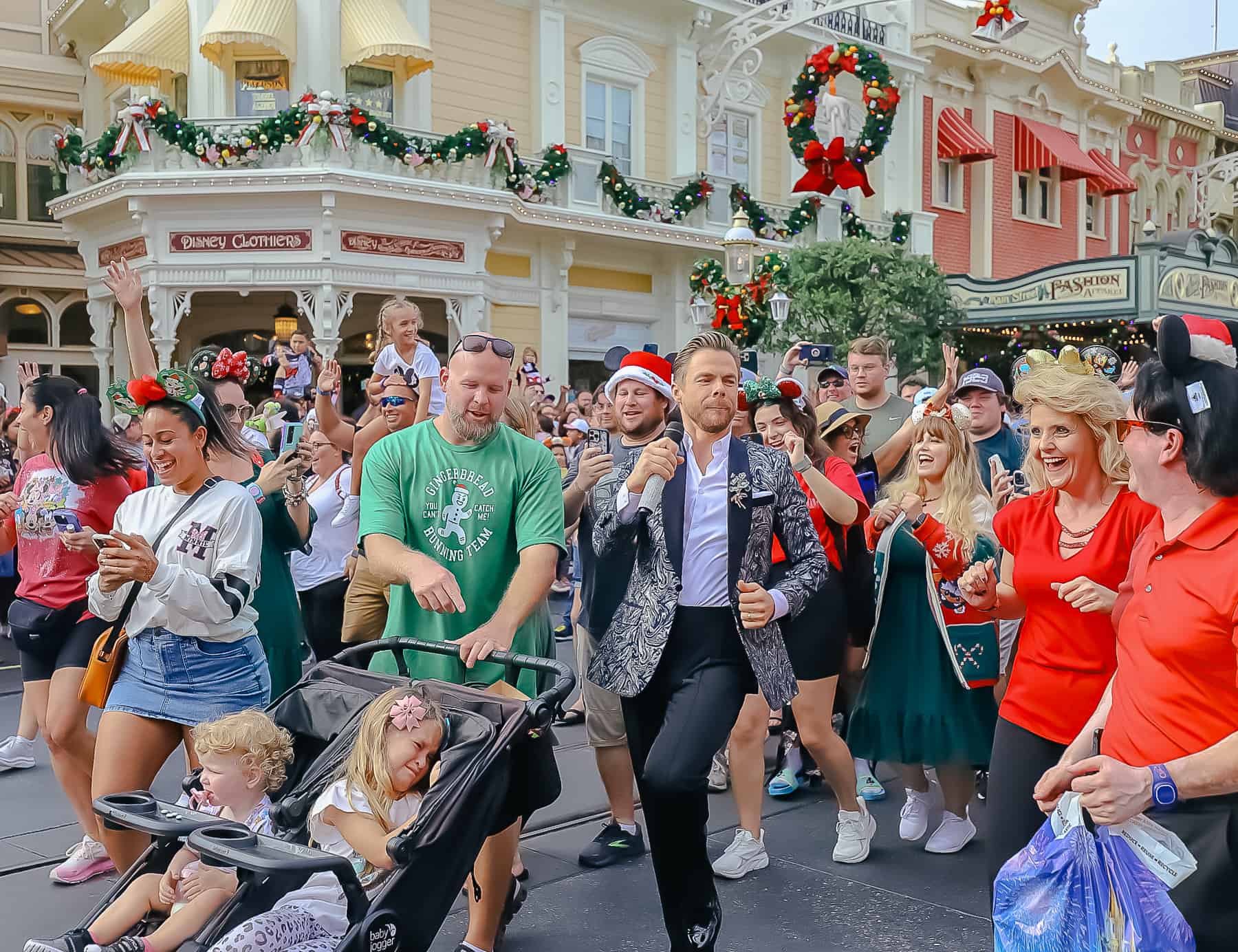 Derek Hough as he walks up Main Street USA.