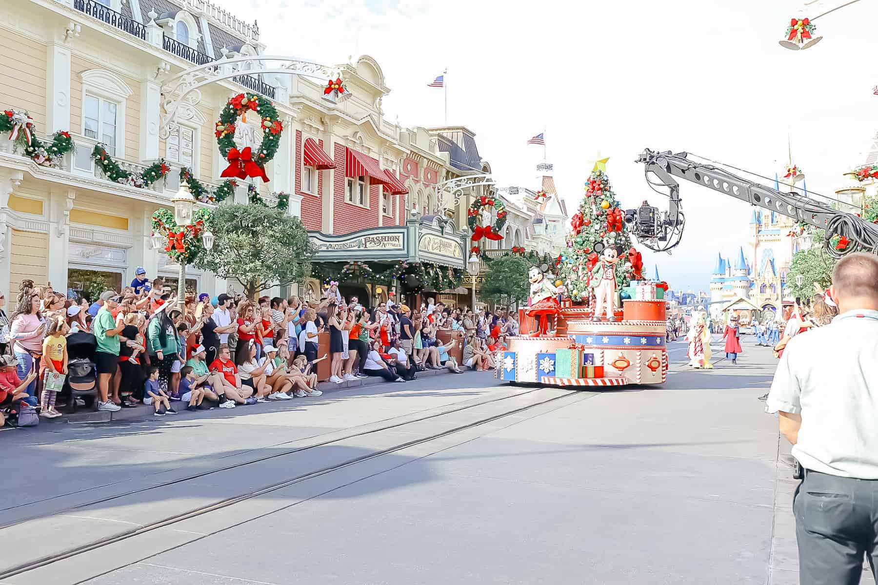 Mickey coming down Main Street USA while being filmed for the Christmas Day Parade. 