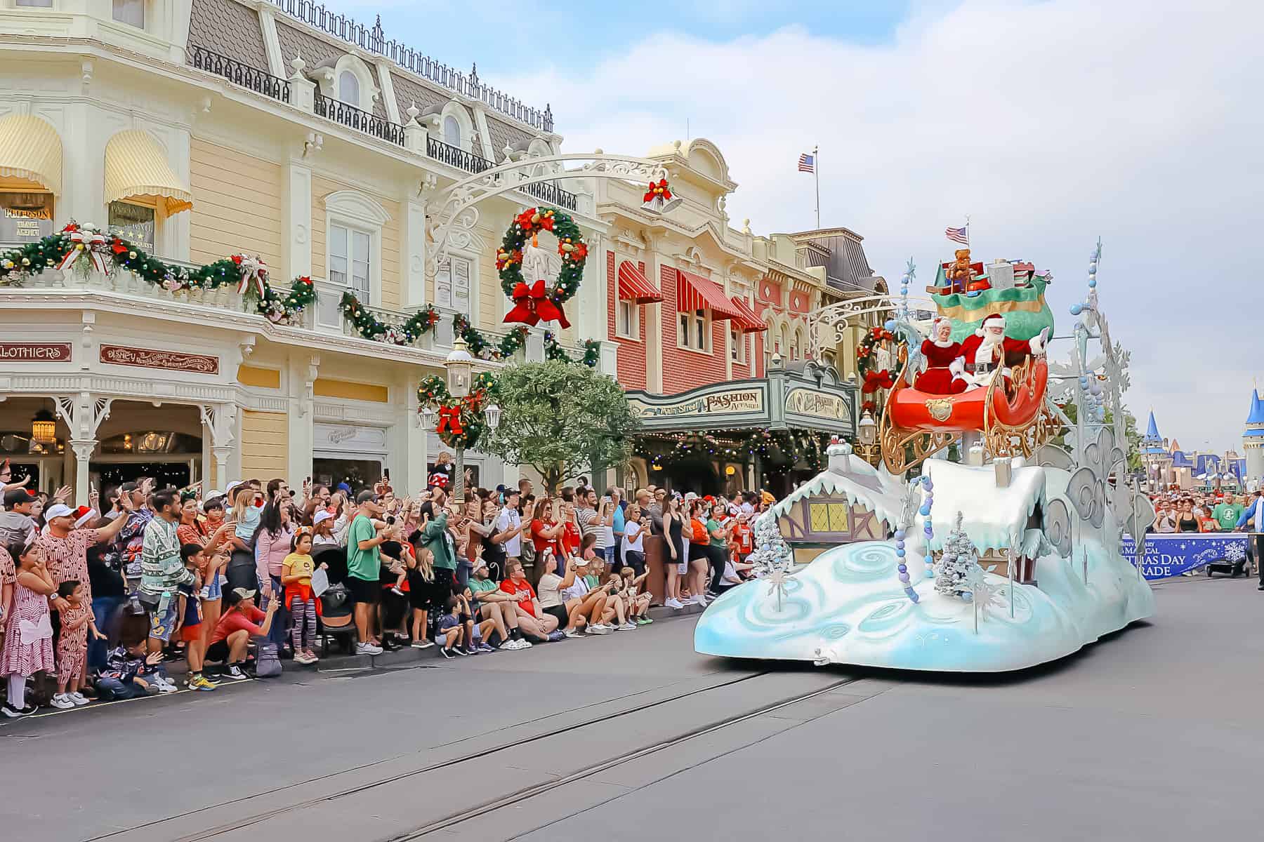 Santa with Mrs. Claus during the daytime parade that was filmed for television at Magic Kingdom.