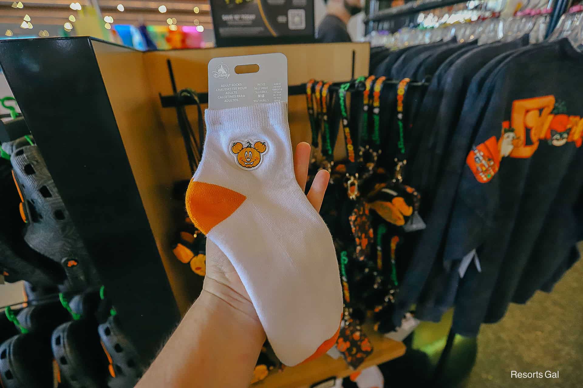 a pair of socks with a Mickey Mouse pumpkin