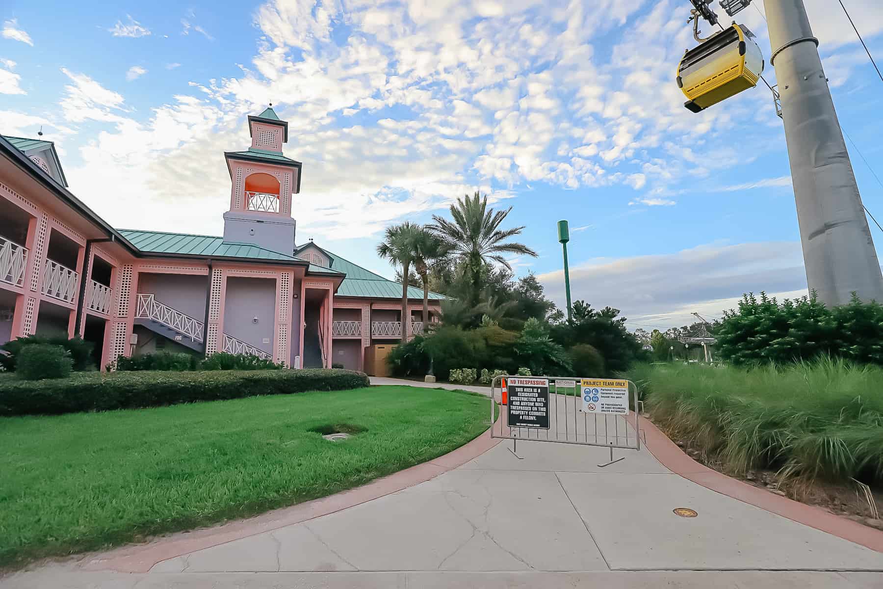 a construction sign blocking off an entrance to a building at Disney Resorts 