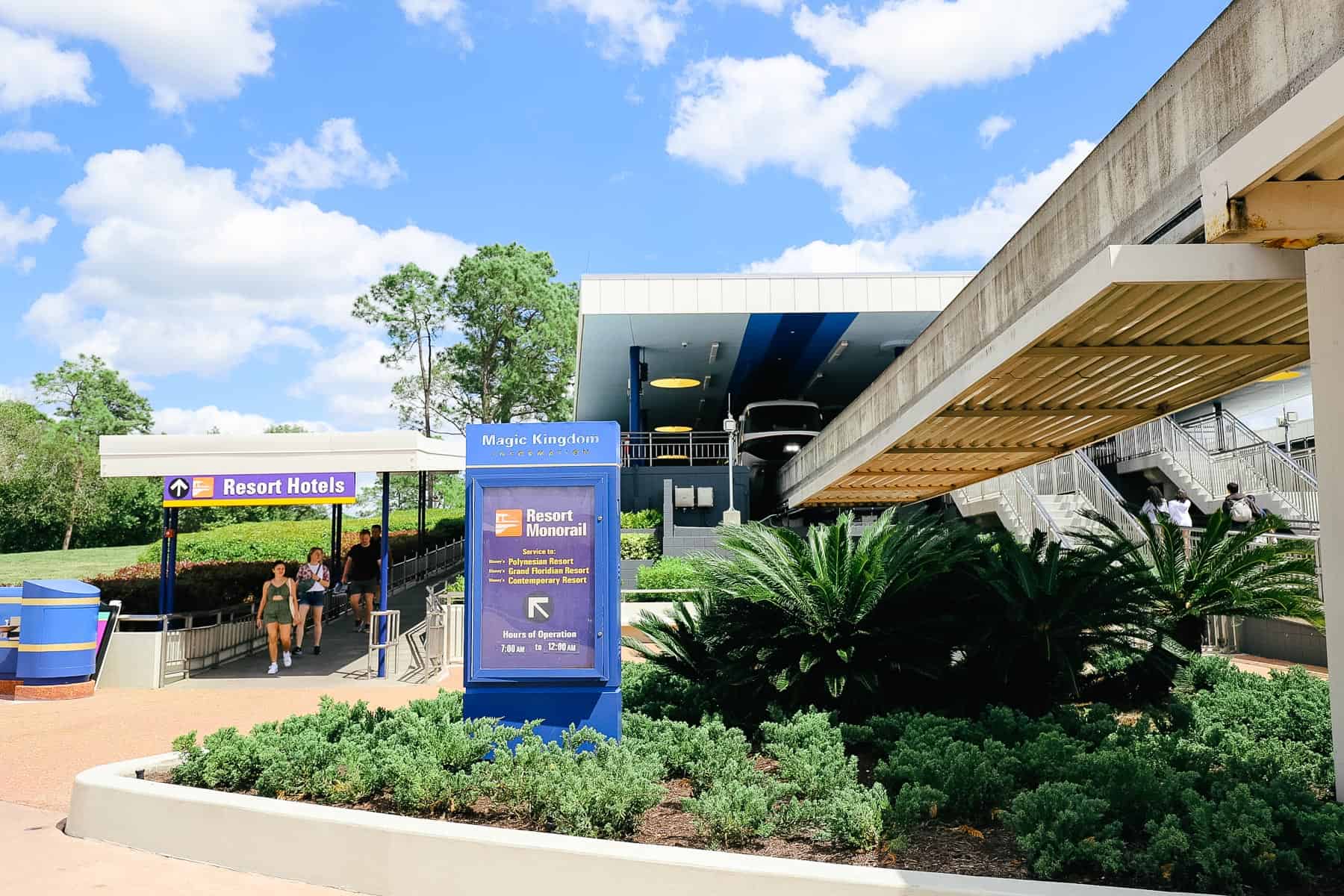 Guests exiting the resort monorail at the Transportation and Ticket Center. 