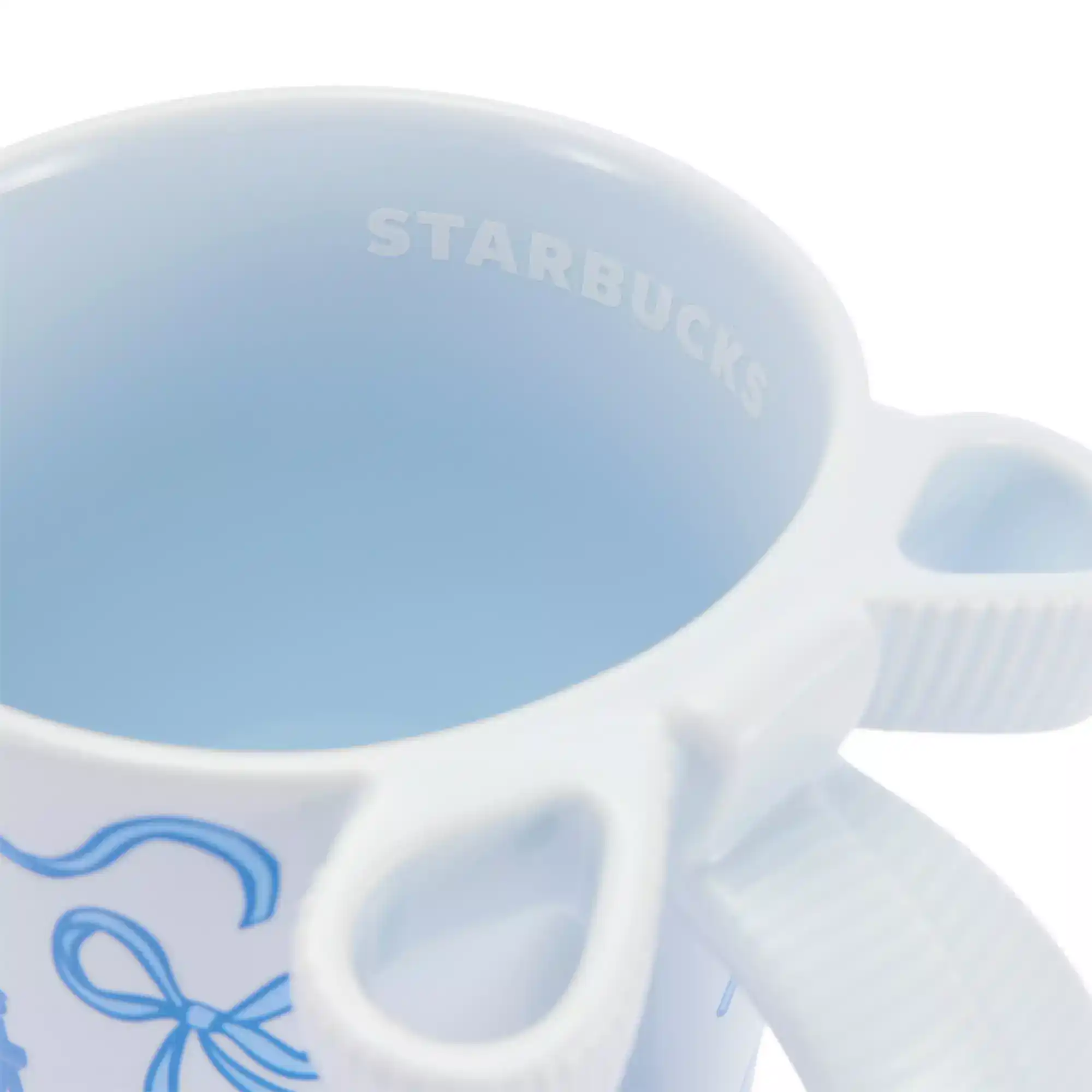 the Starbucks logo in white inside the mug 