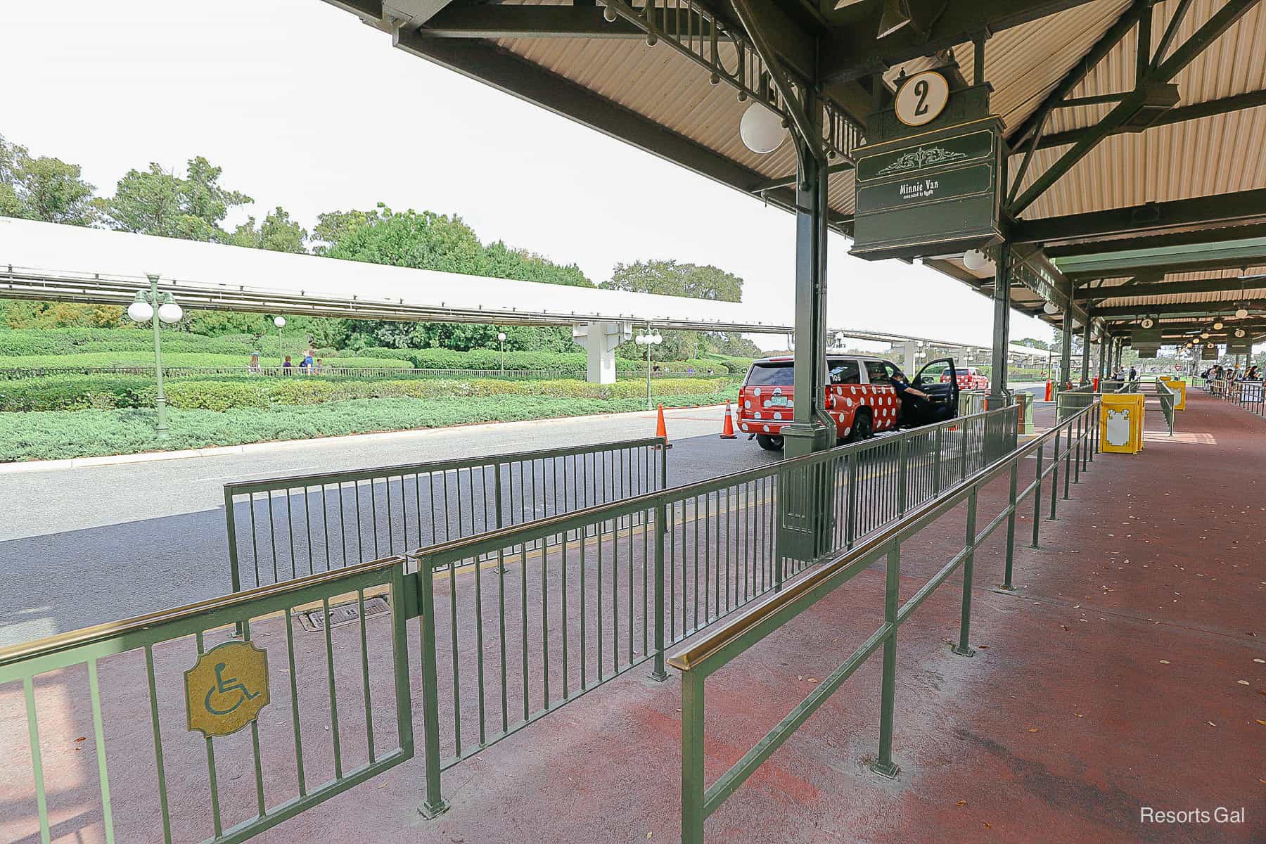 A Minnie Van dropping off guests at Magic Kingdom. 