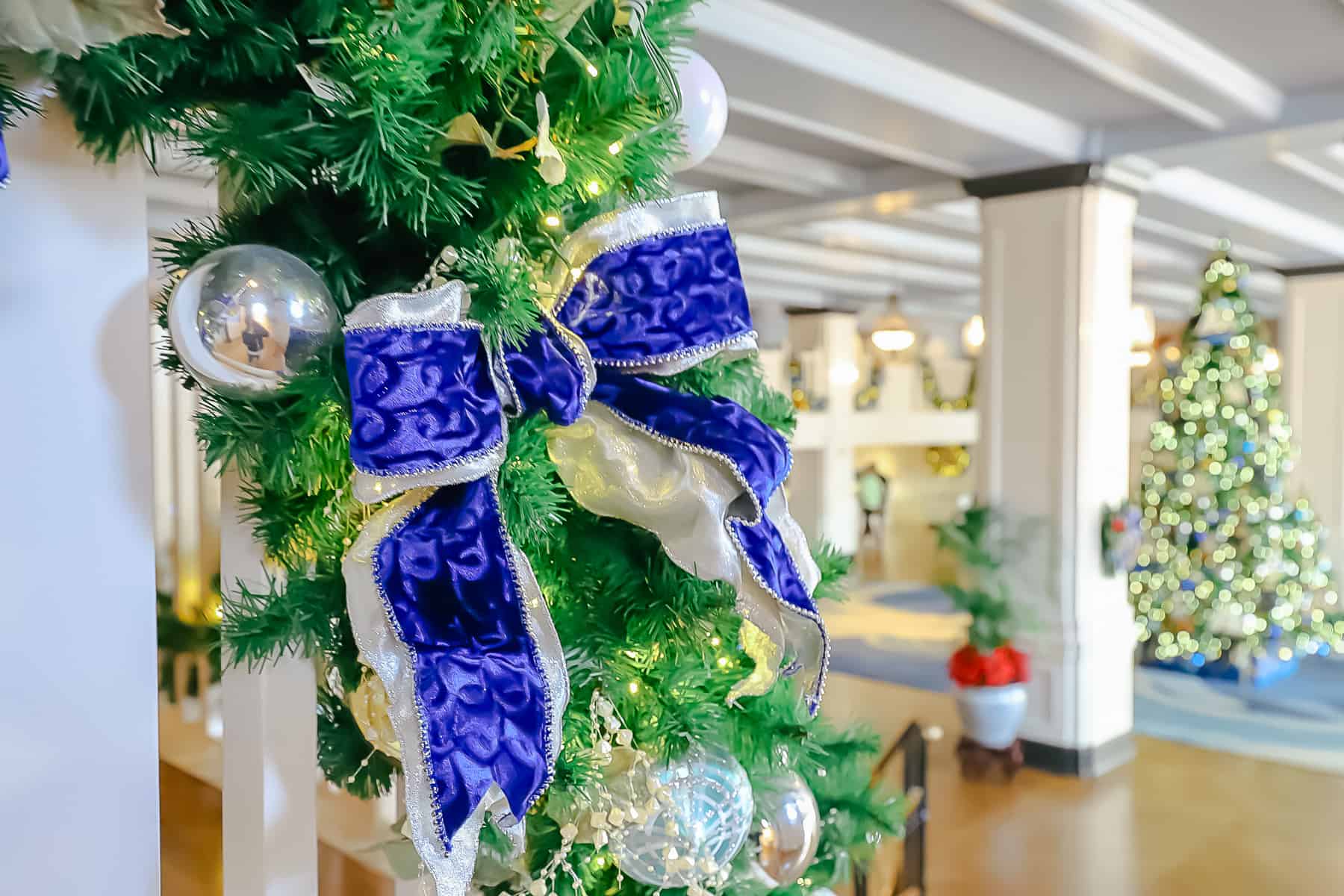 a bow with a bokeh background effect of the Christmas tree 