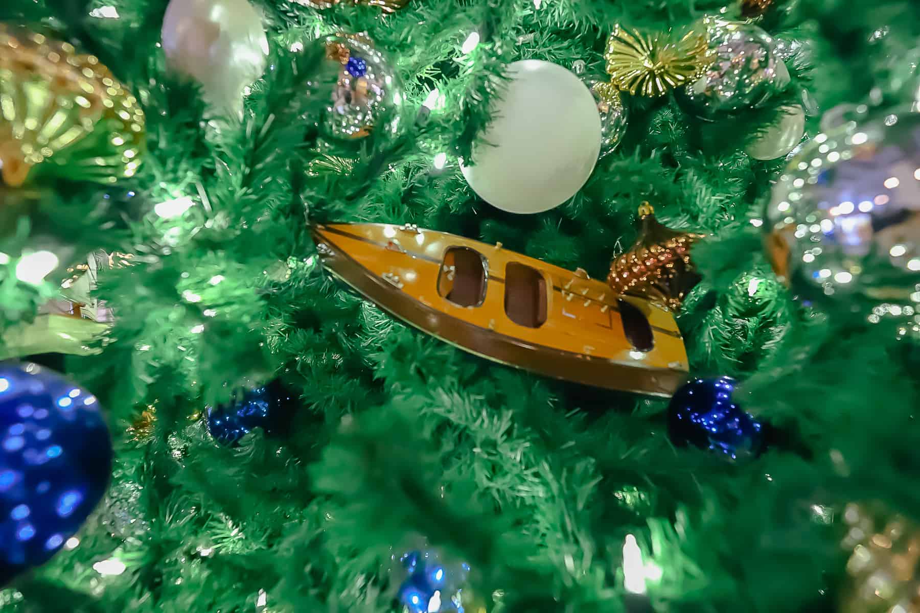 Christmas tree decorations with glass ornaments and boats 