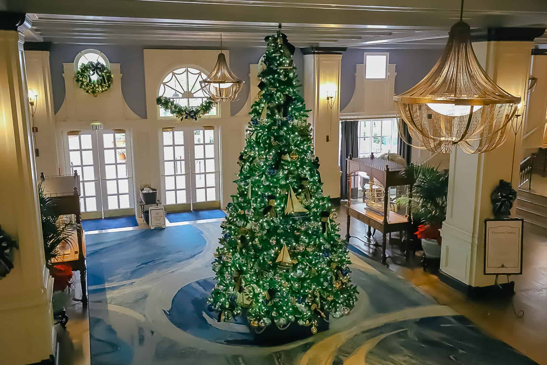 a view of Disney's Yacht Club Christmas tree taken from the hotels 2nd floor balcony