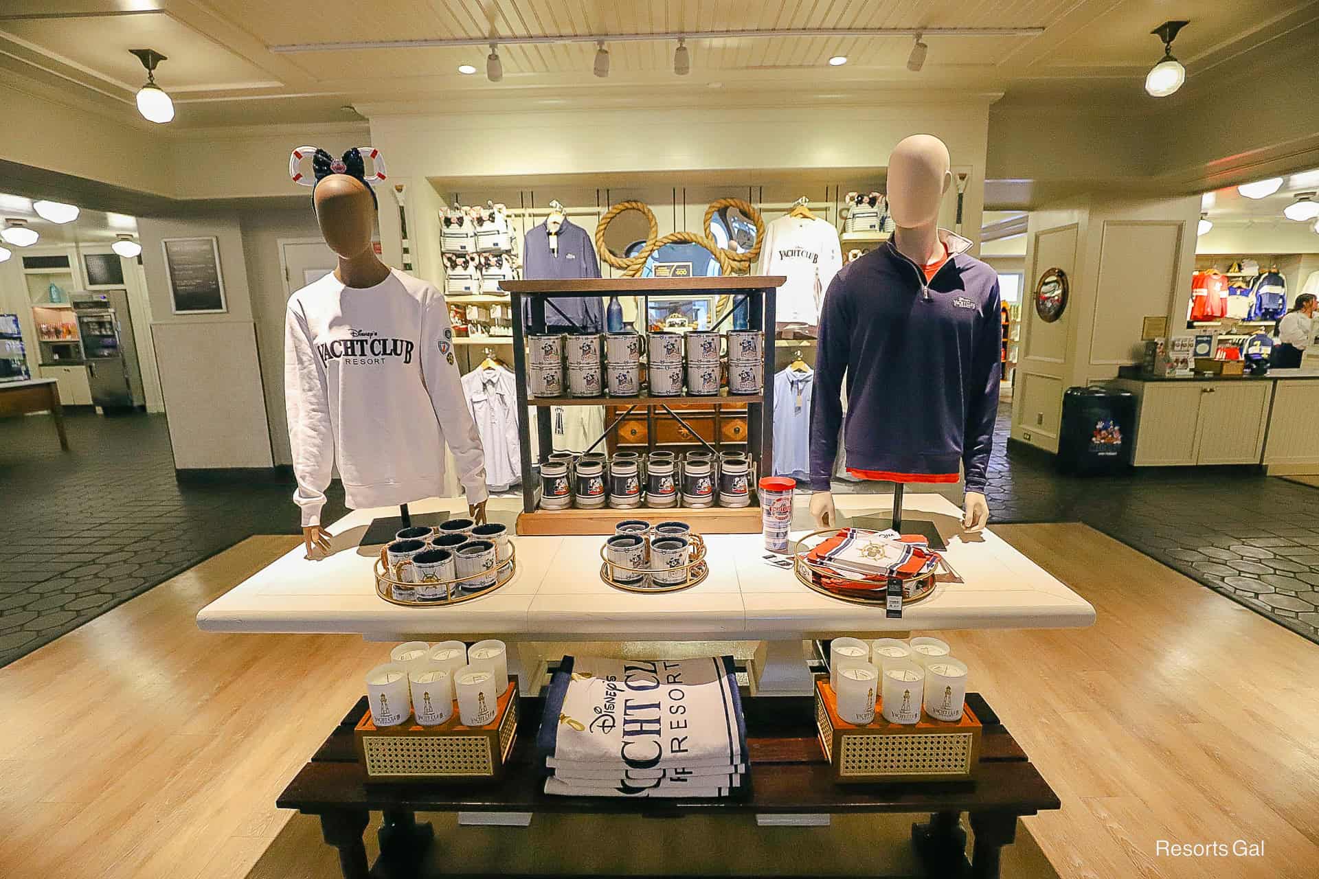 a display with resort branded merchandise at the entrance of the Yacht Club's gift shop