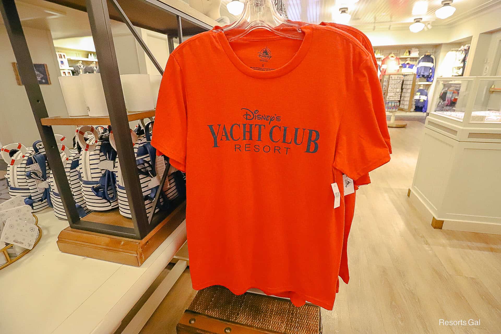 a red shirt with the Yacht Club logo shirt