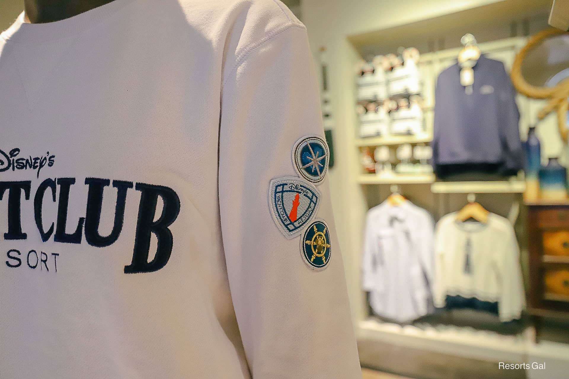 patches on the arm of the sweatshirt