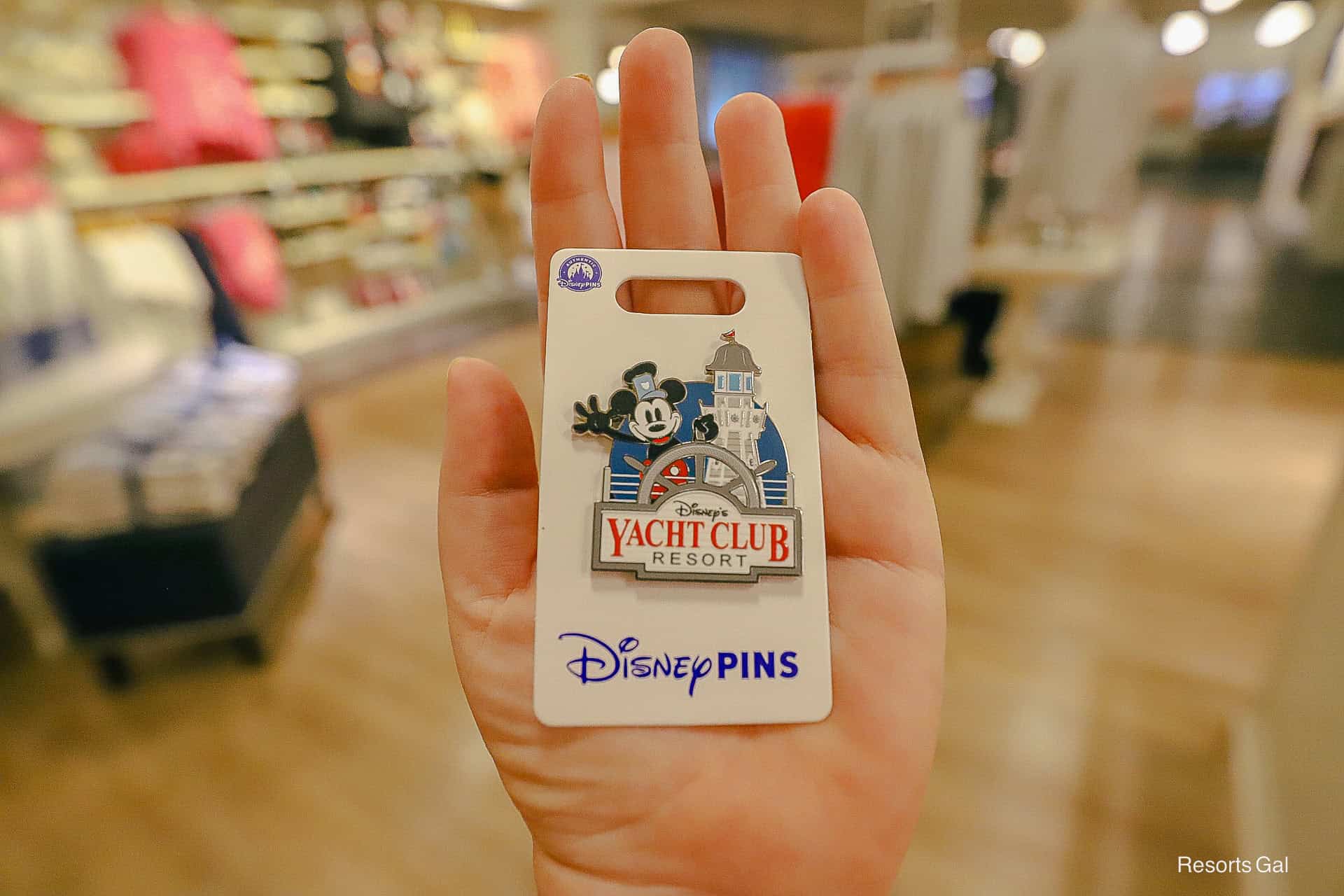 a new Yacht Club pin with Mickey Mouse at the ship's wheel