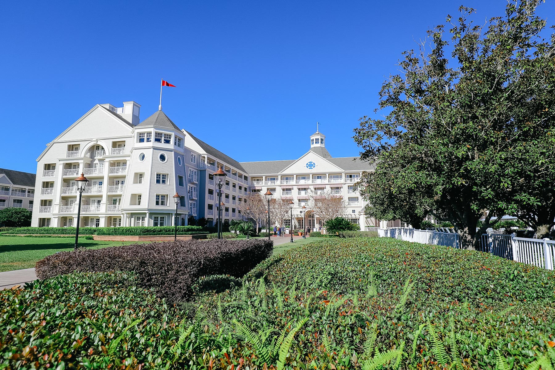 Disney's Yacht Club with crystal clear blue skies in the background 