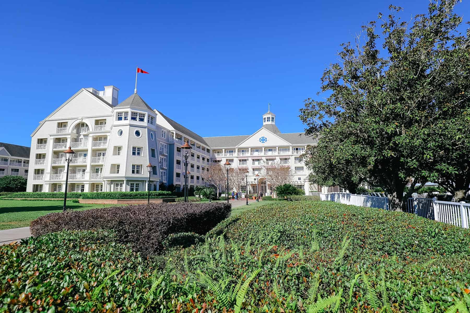 Disney's Yacht Club with crystal clear blue skies in the background 