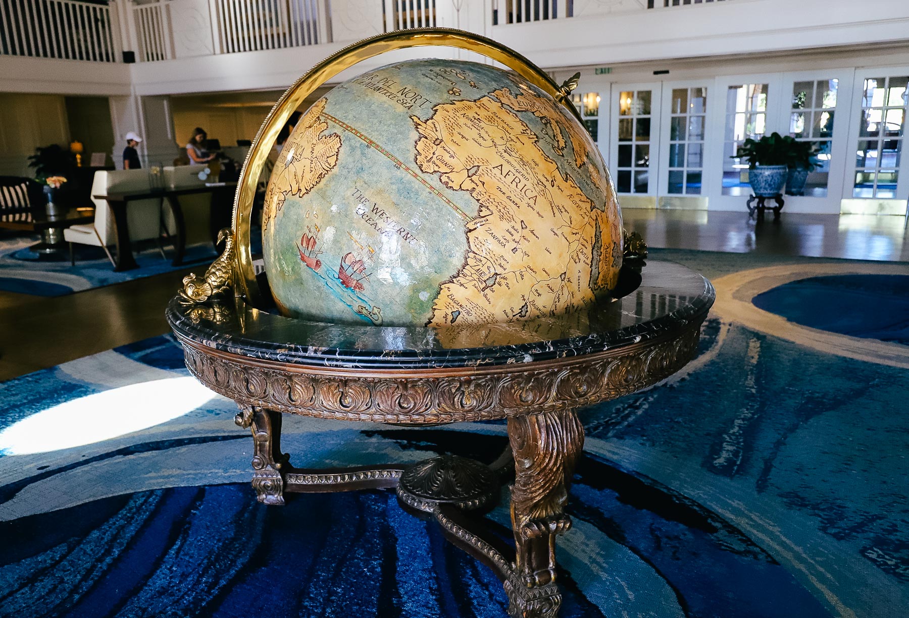 the giant globe that sits in the center of the Disney Yacht Club Lobby 