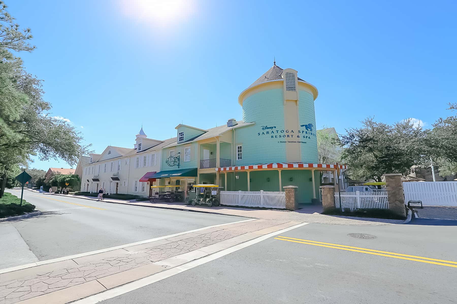 Sign reads Disney's Saratoga Springs Resort and Spa A Disney Vacation Club Resort. 