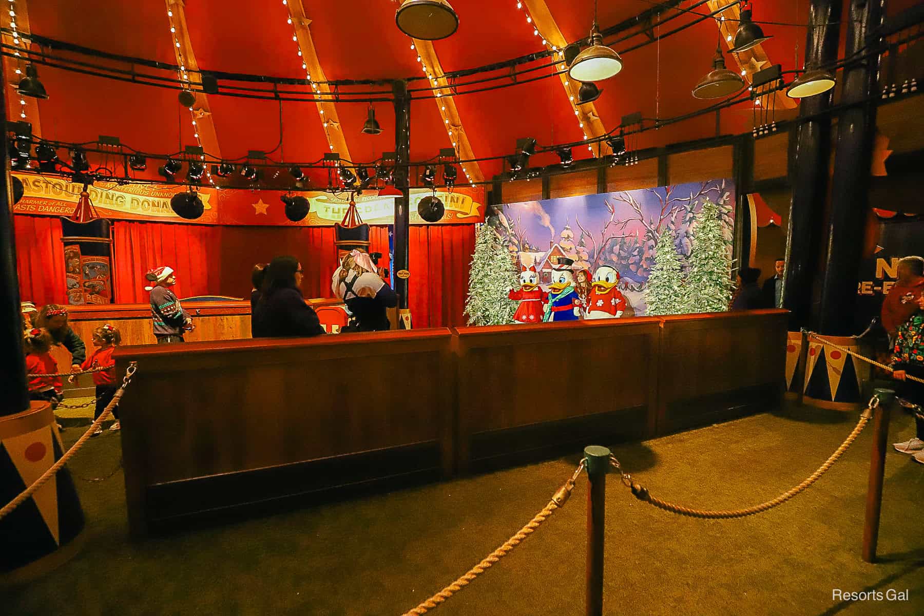 a PhotoPass photographer taking photos of the characters 