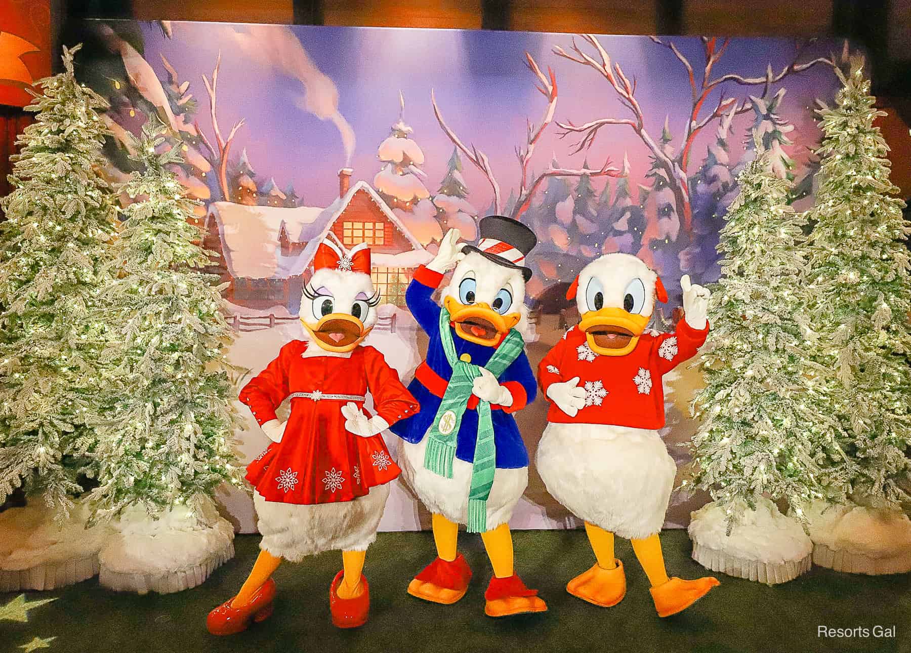 All three characters in their holiday outfits