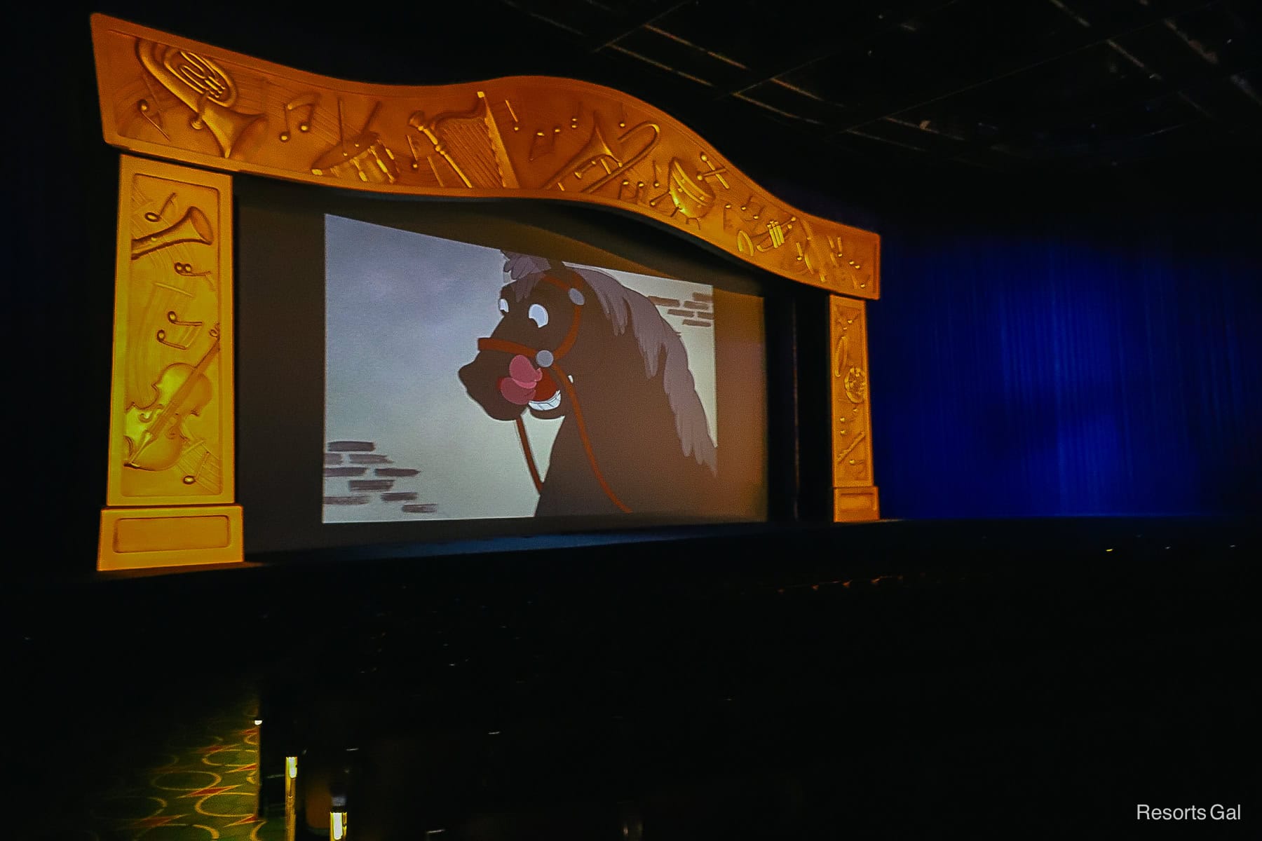 guests watching Halloween cartoons in the theater after the trick-or-treat trail