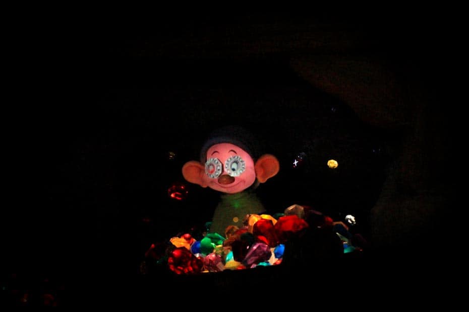 Dopey in the mine with diamonds over his eyes. 