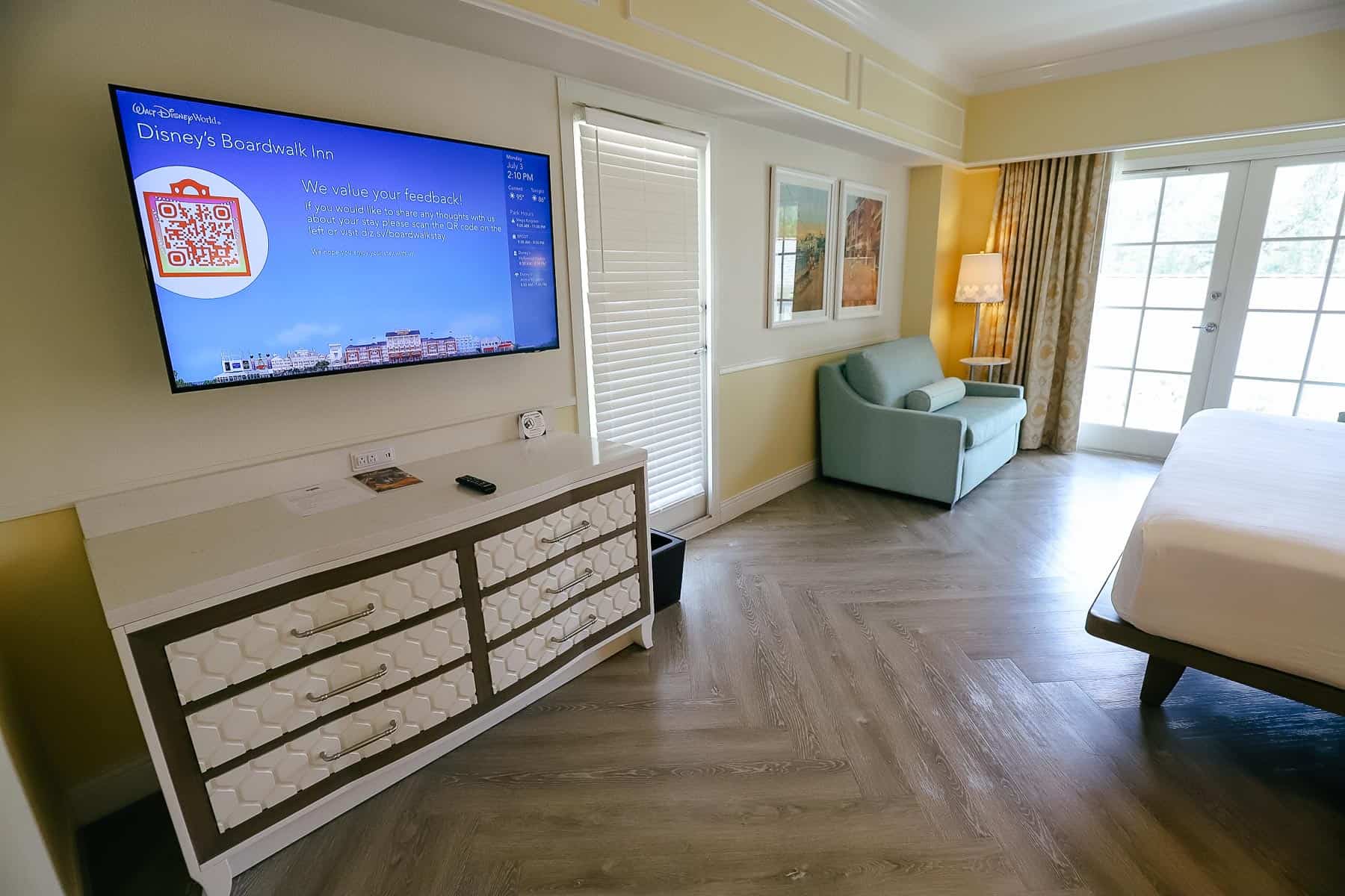 dresser and flat screen television in room at Disney's Boardwalk 
