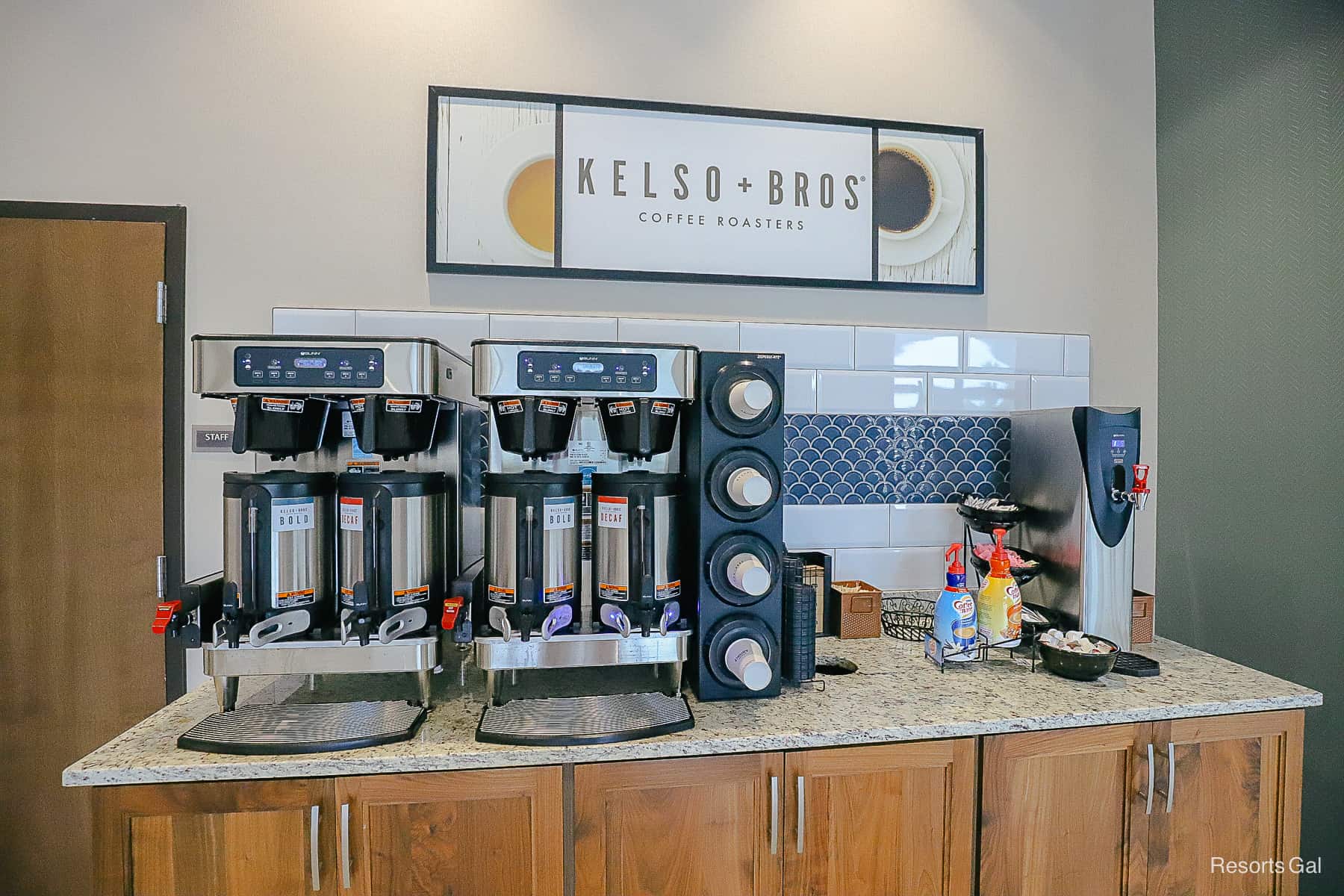 A stand with complimentary coffee for guests 