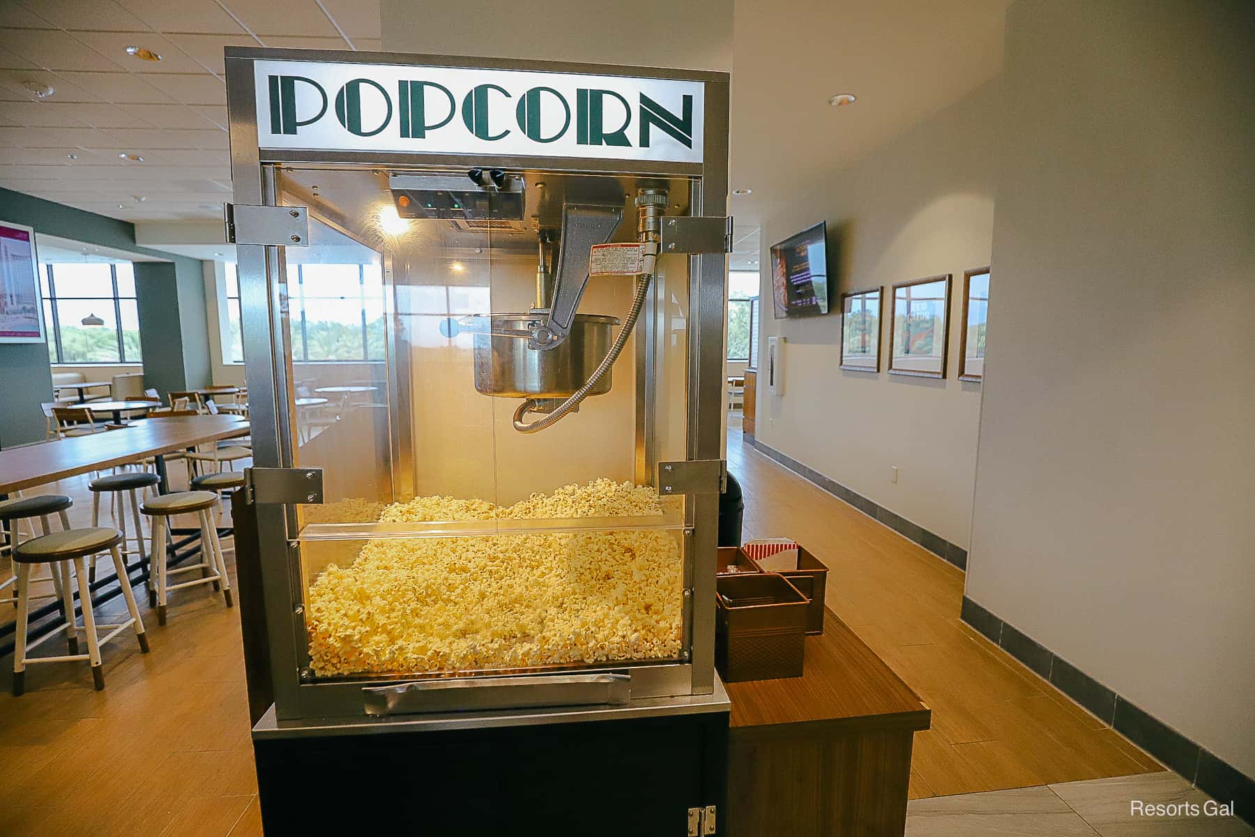 A machine with popcorn for guests to use at their leisure. 
