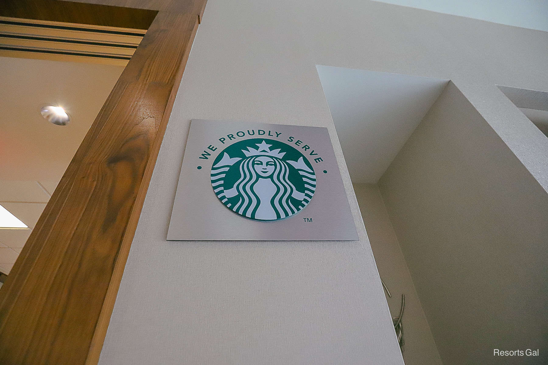 Starbucks logo over the gift shop at Drury Plaza Hotel Disney Springs. 