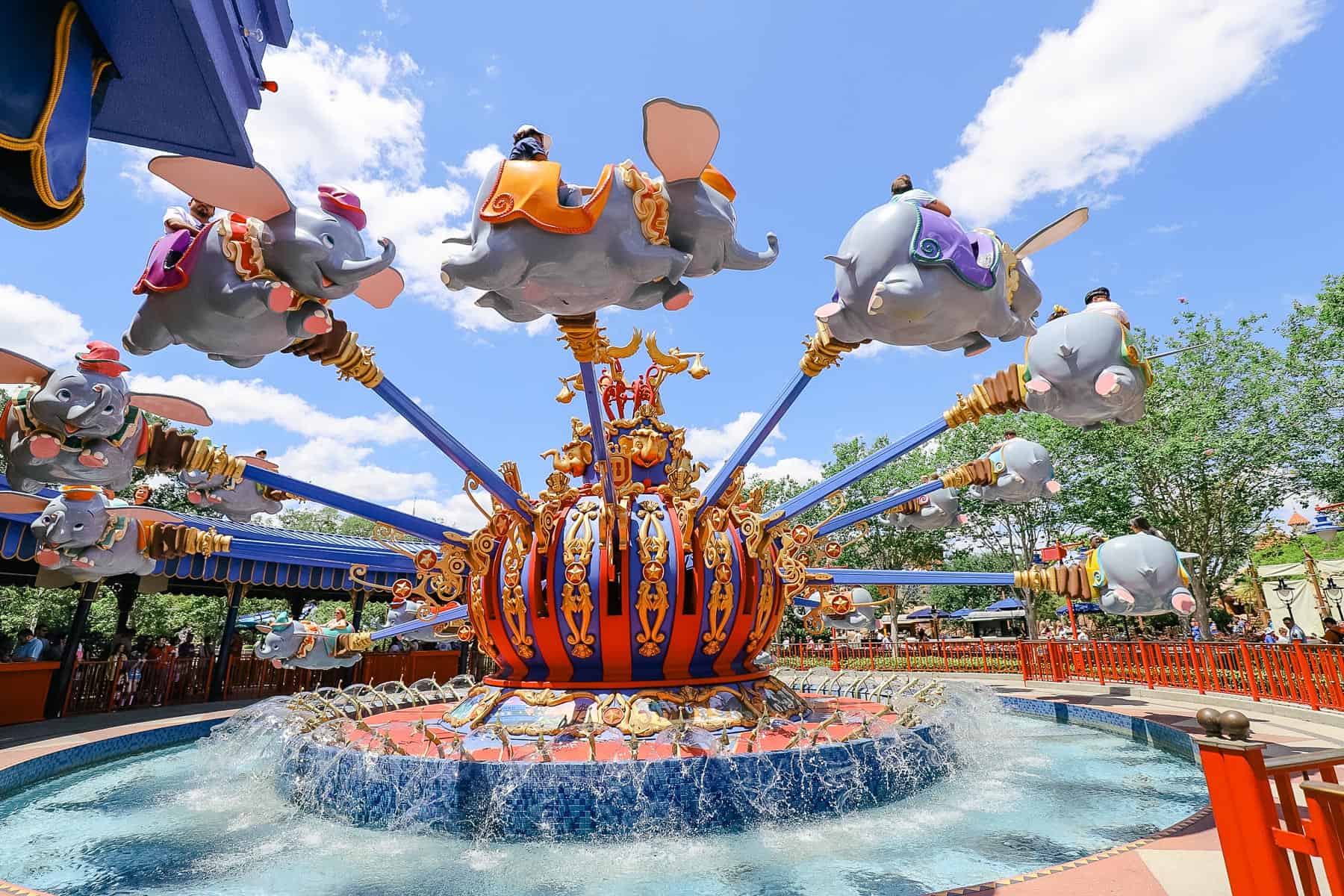 Dumbo ride vehicles spinning over Storybook Circus at Magic Kingdom. 