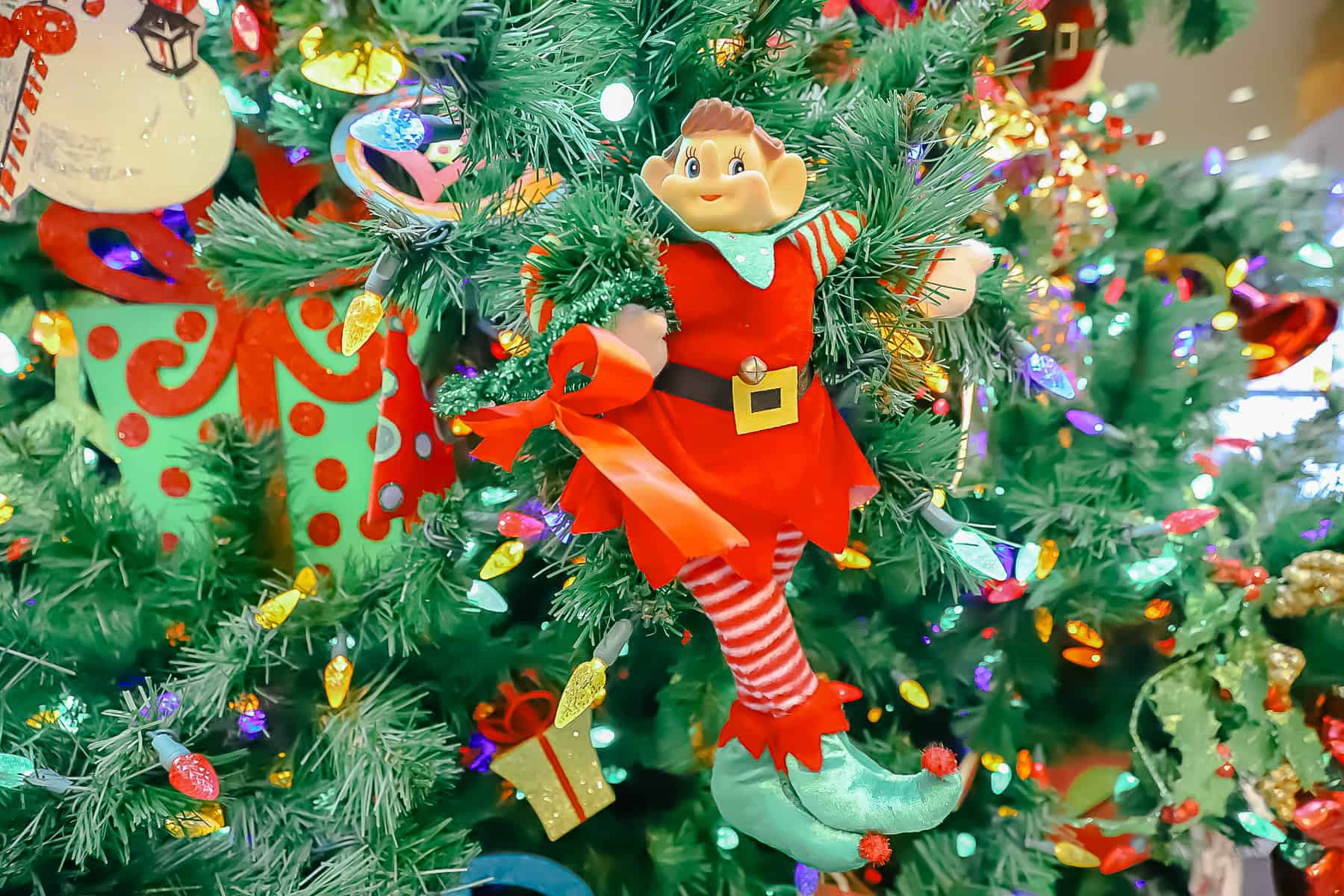 Elves places on the branches of the tree at Pop Century 