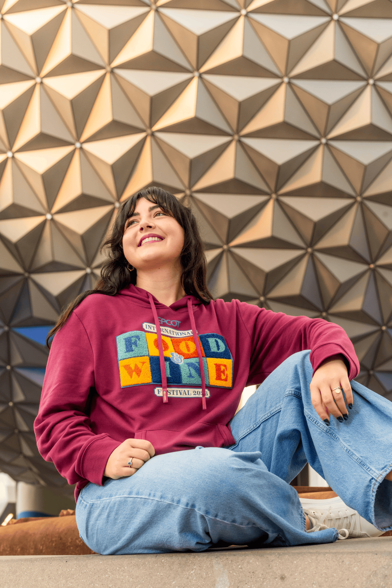 a person wearing a Food and Wine Festival hoodie 2026