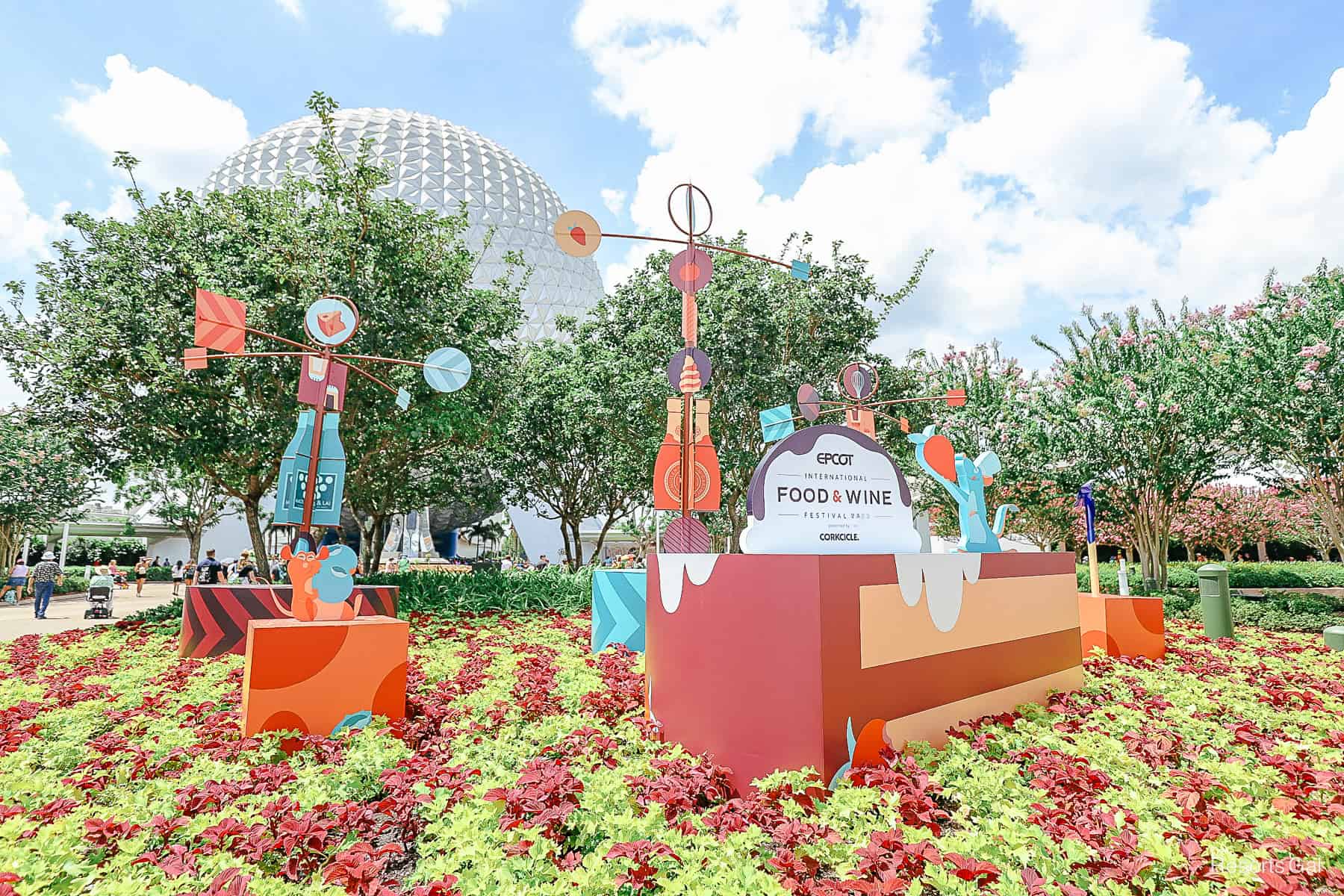 a display in front of Spaceship Earth celebrating the Food and Wine Festival at Epcot