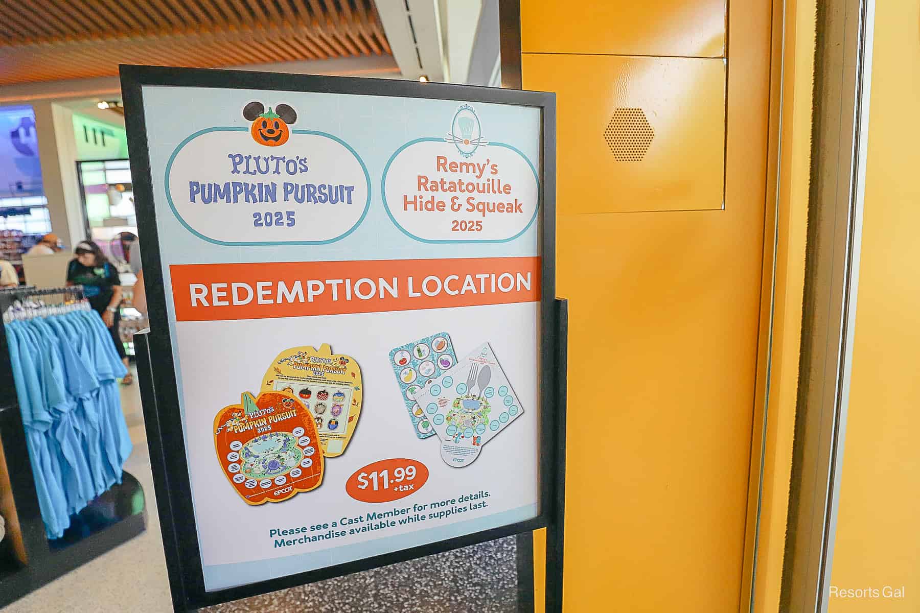 a sign that shows the gift shop is a redemption location for both 2025 Scavenger Hunts at Epcot International Food and Wine Festival