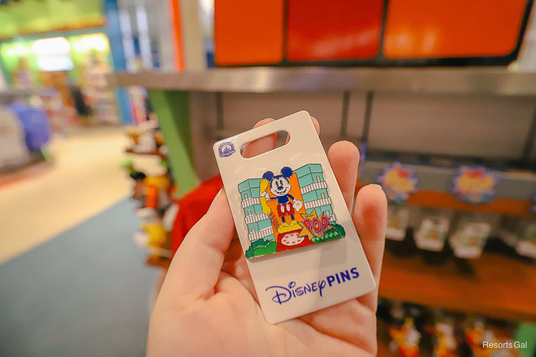 a Pop Century pin with Mickey Mouse rotary dial phone 