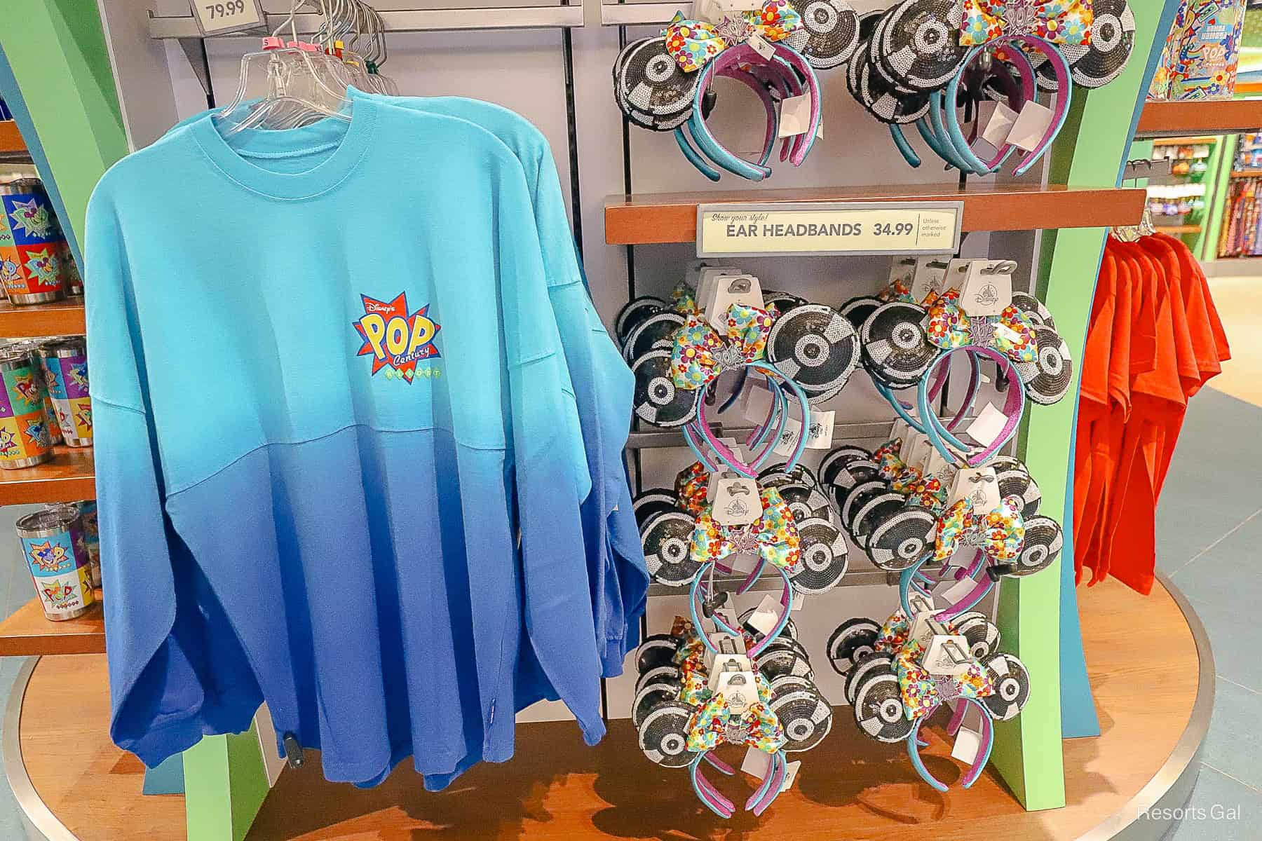 a display with a Pop Century spirit jersey front and Ear Headbands 