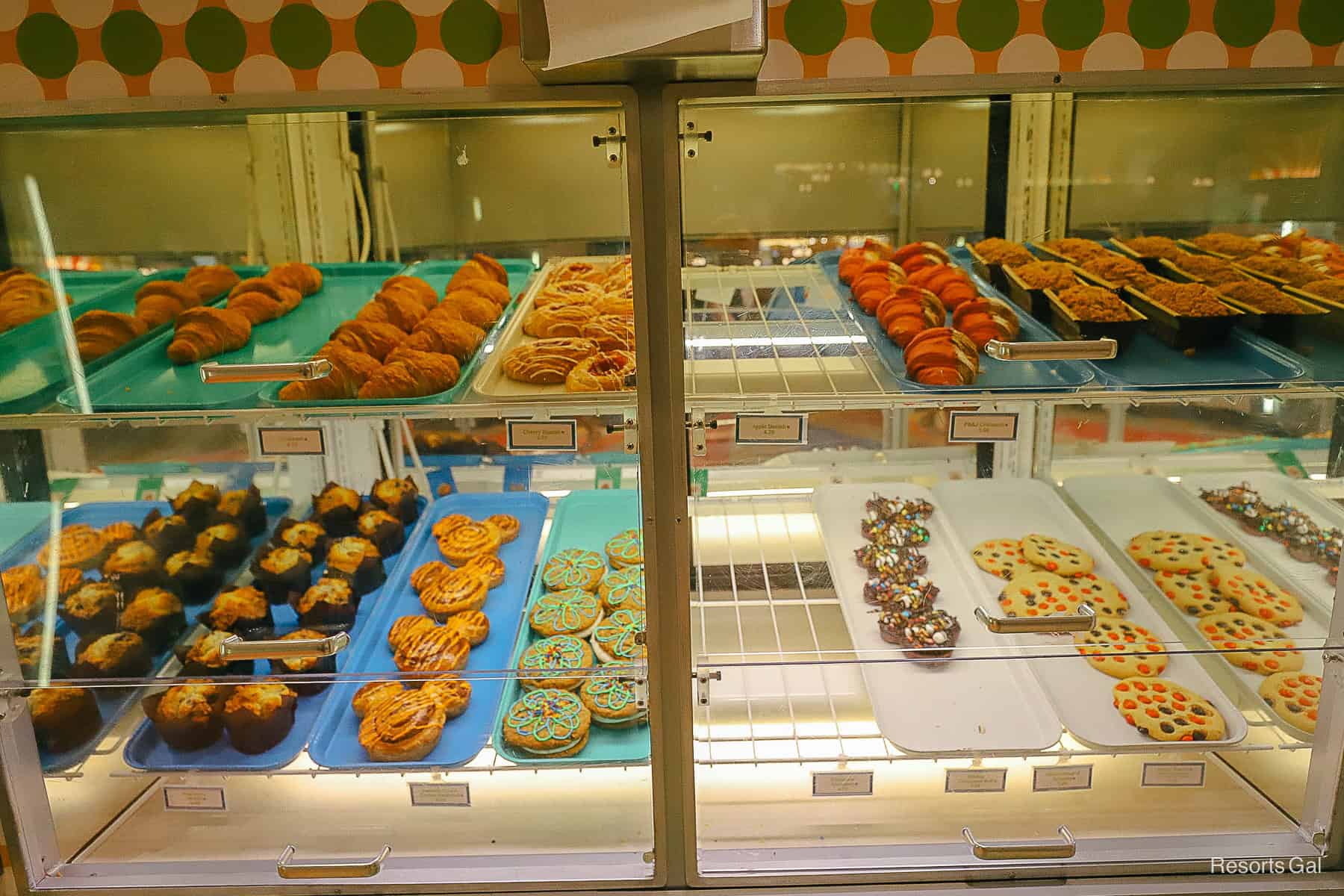 a pastry case filled with items for dining at Pop Century Resort