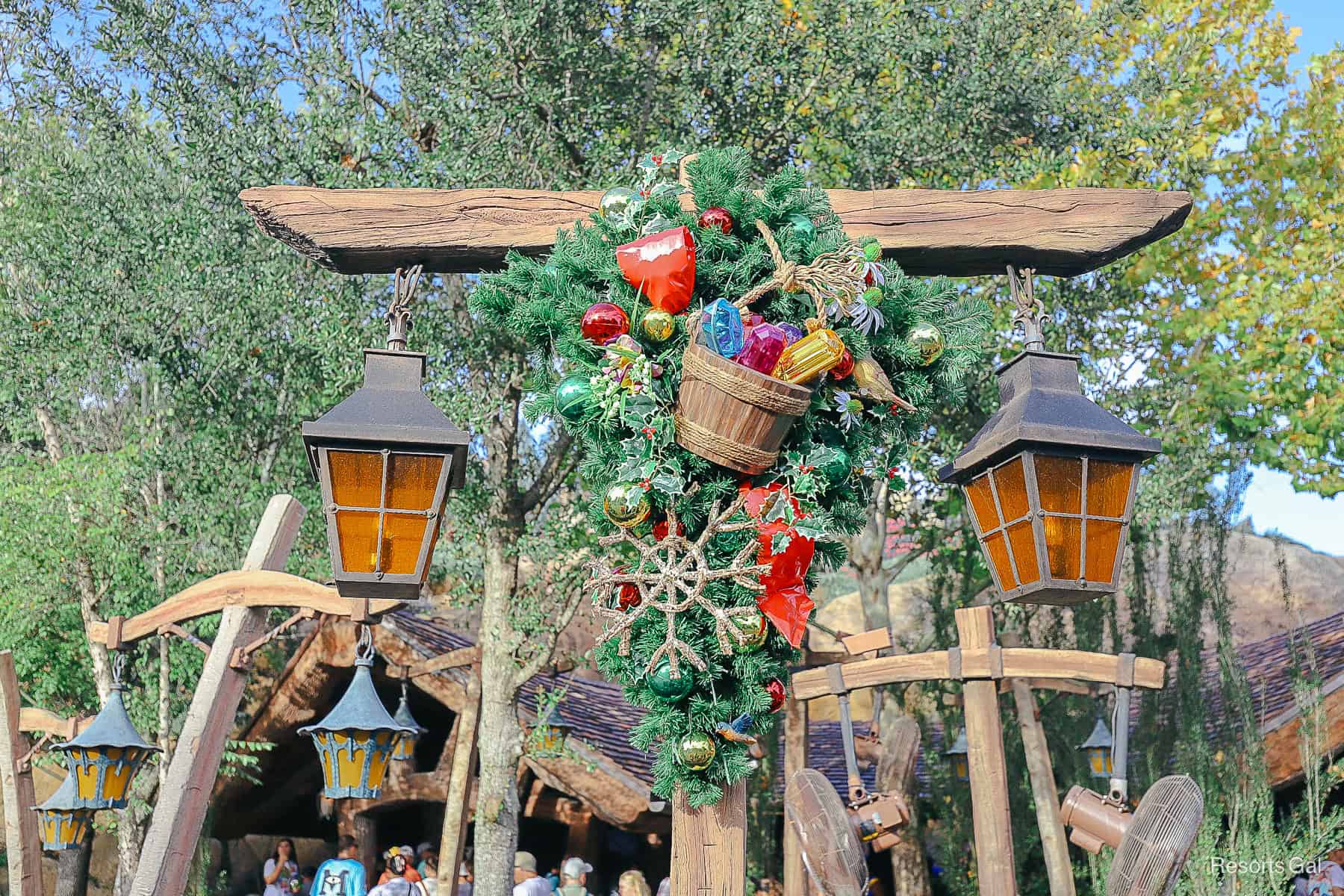 another holiday decorated lamp post in Fantasyland at Magic Kingdom 