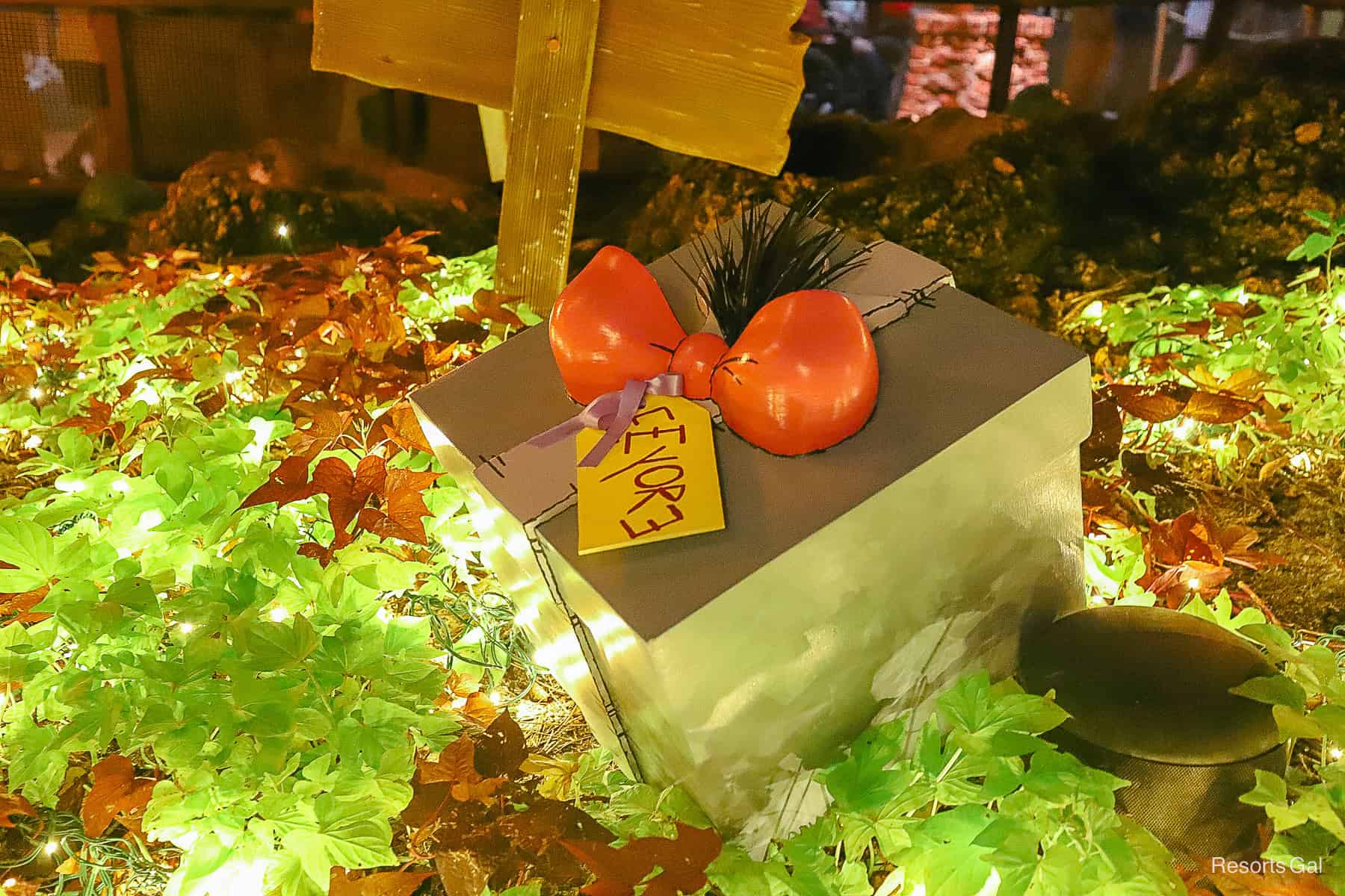 a big blue box with pink ribbon for Eeyore. 