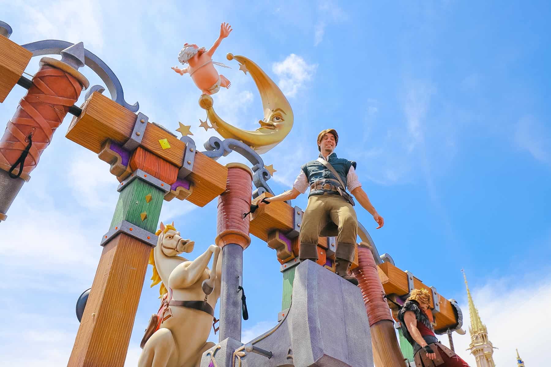 Flynn Rider on the float in the Festival of Fantasy Parade. 