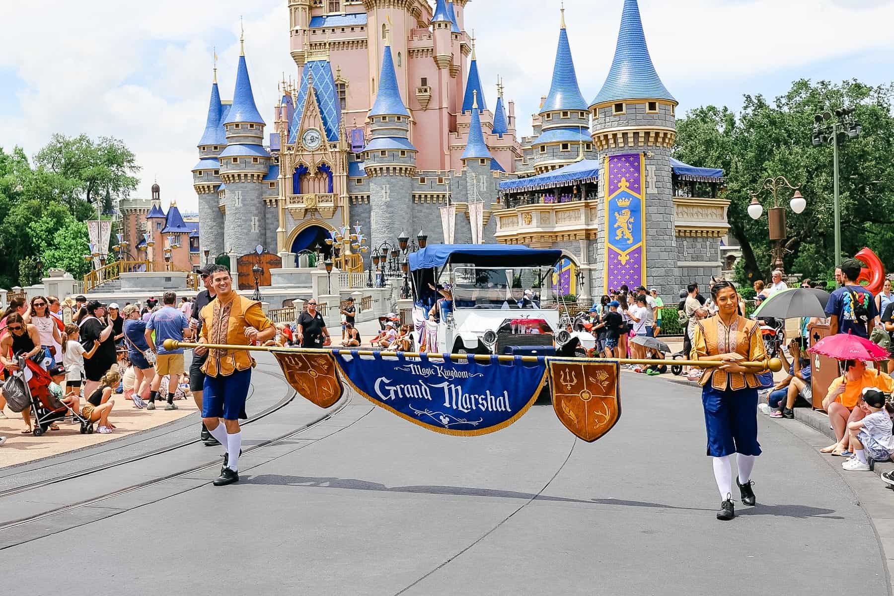 The Grand Marshals lead the pre-parade by walking in front of the family of the day. 