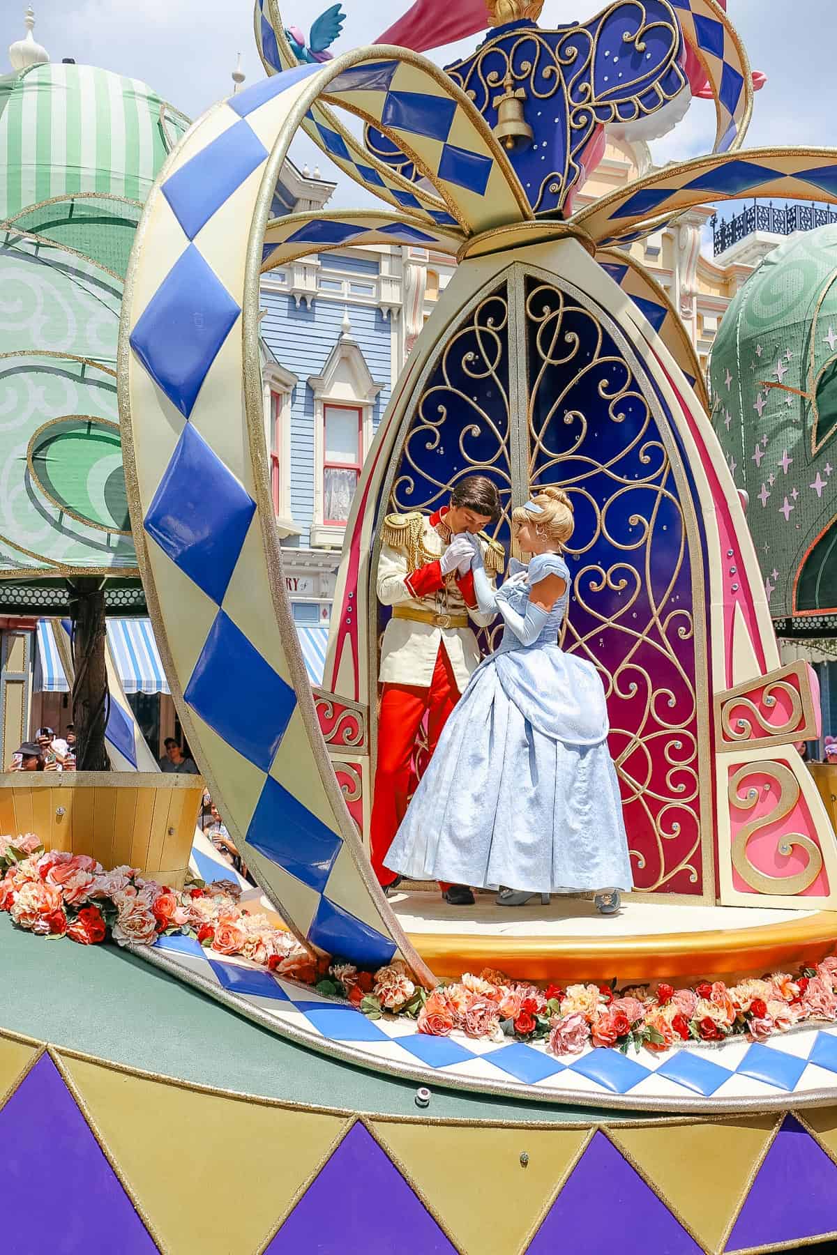 Prince Charming and Cinderella ride on the opposite side of the spinning float. 