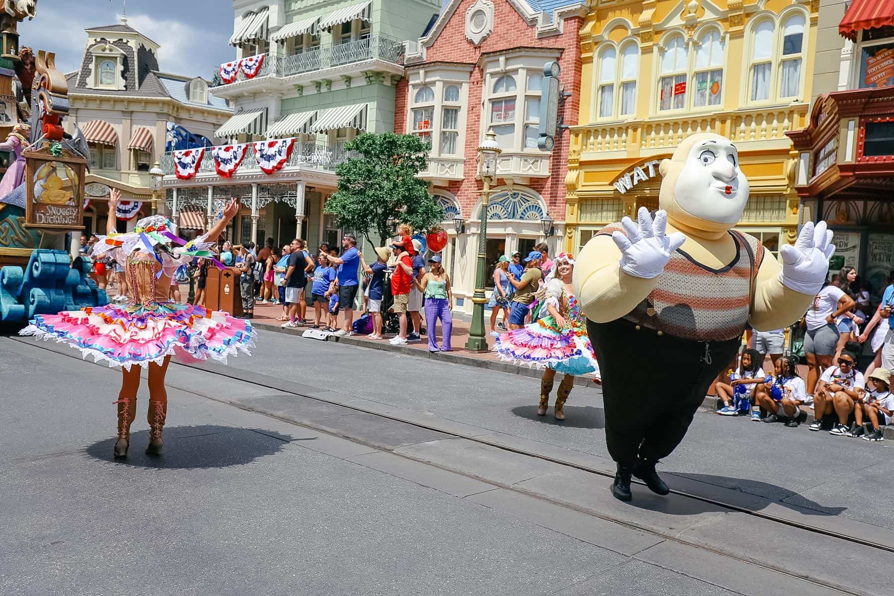 Performers from Tangled on Main Street during the parade at Magic Kingdom. 