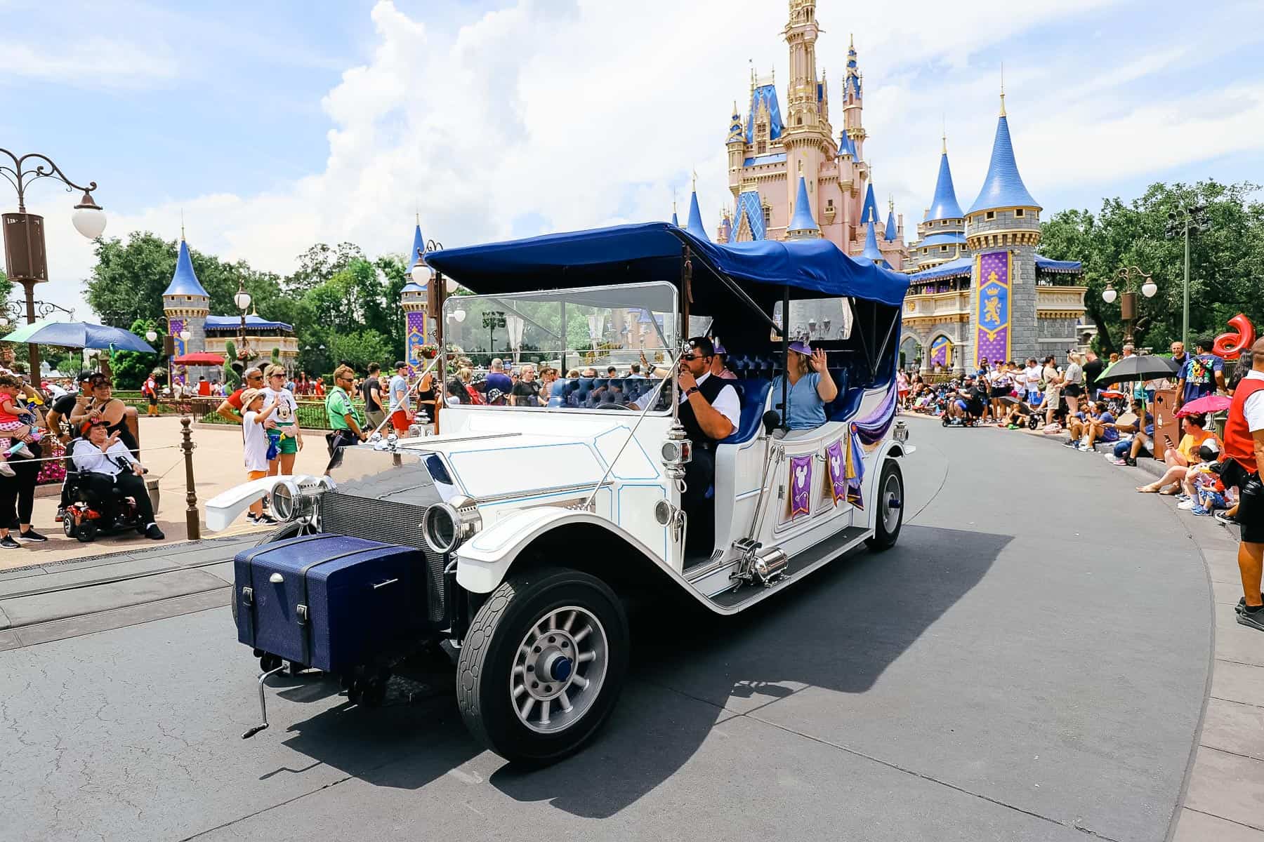 A family is selected as the family of the day to ride the route at the beginning of the parade. 