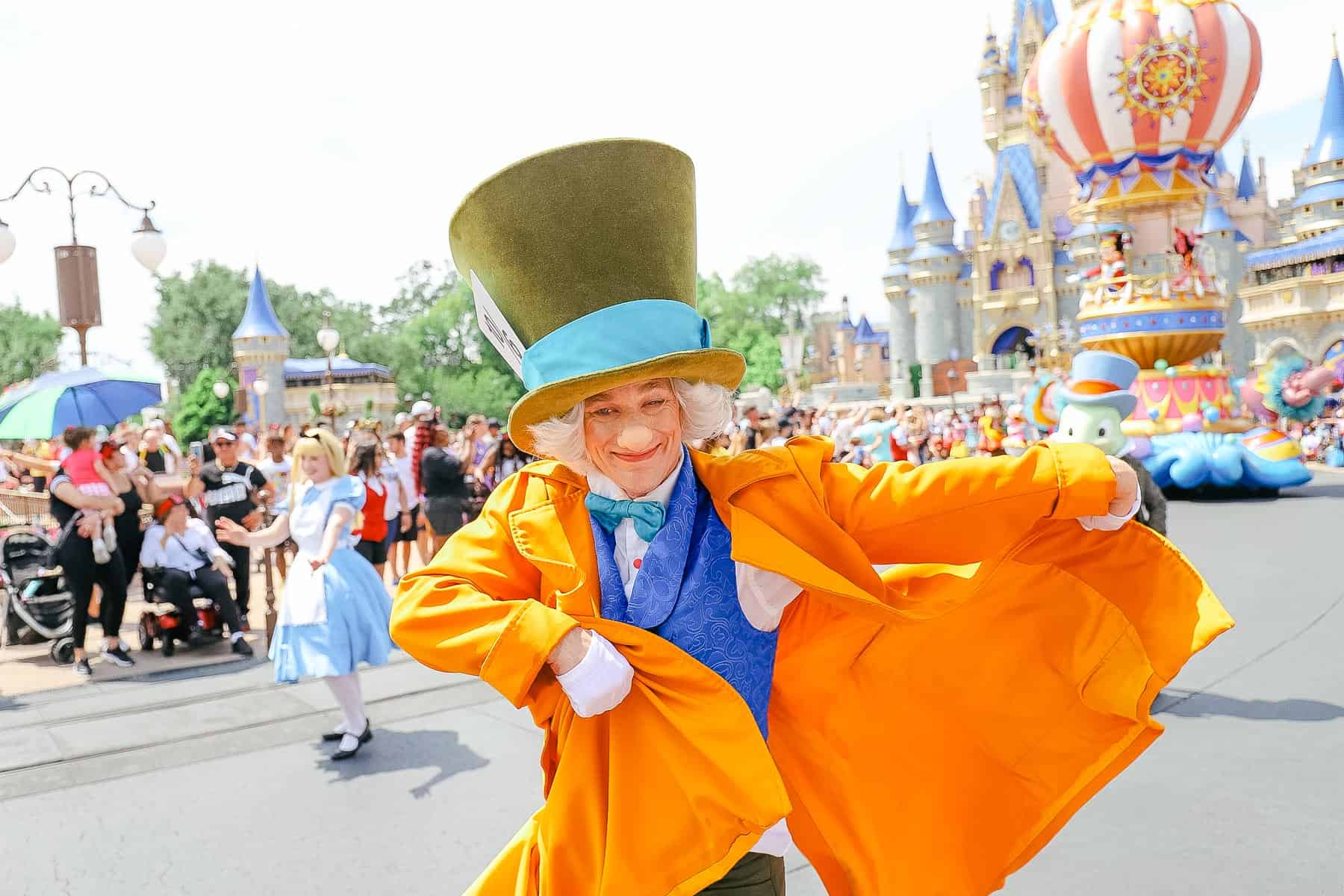 The Mad Hatter poses for a photo during the parade.