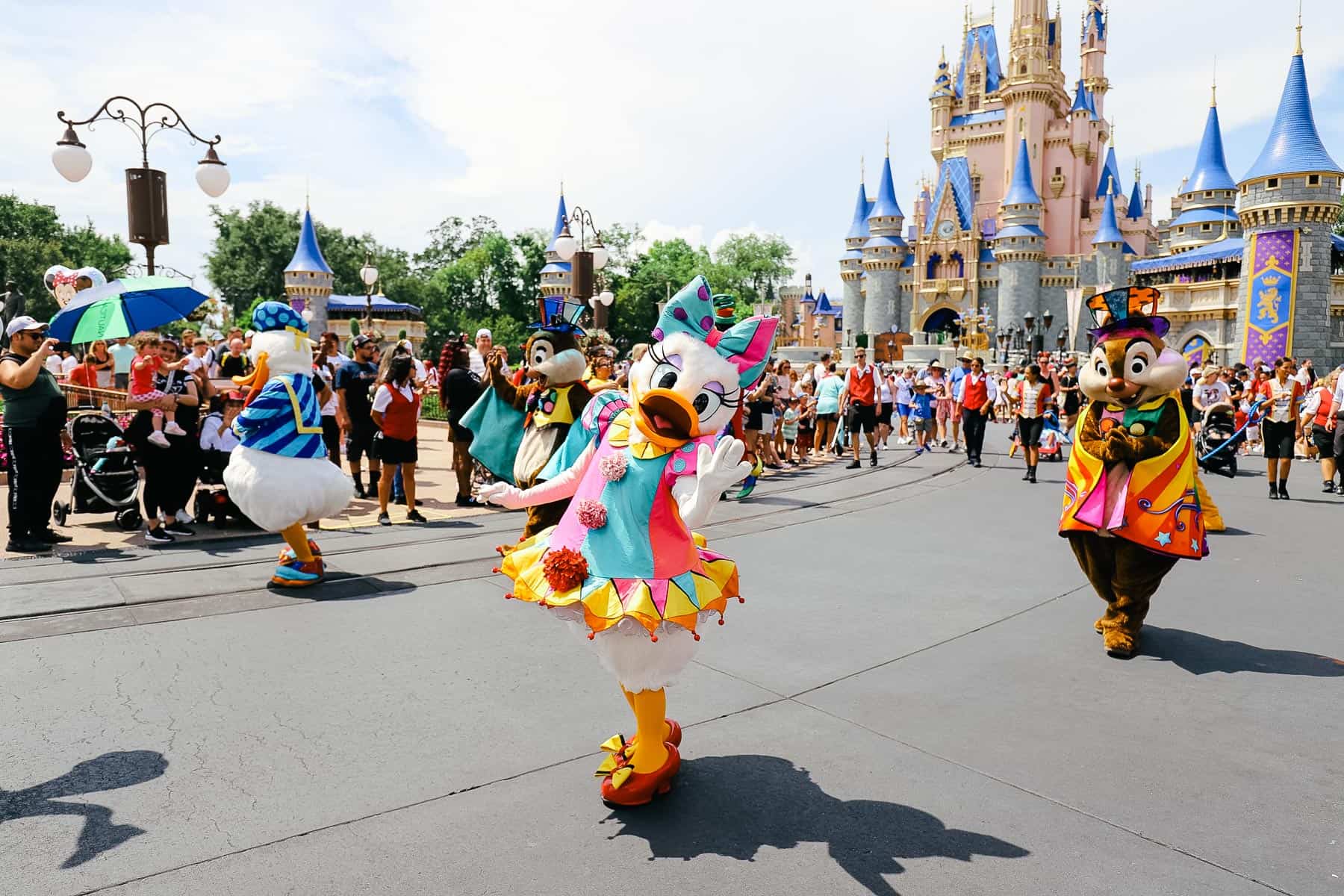Daisy, Donald, Chip and Dale as walking performers during the Magic Kingdom parade. 