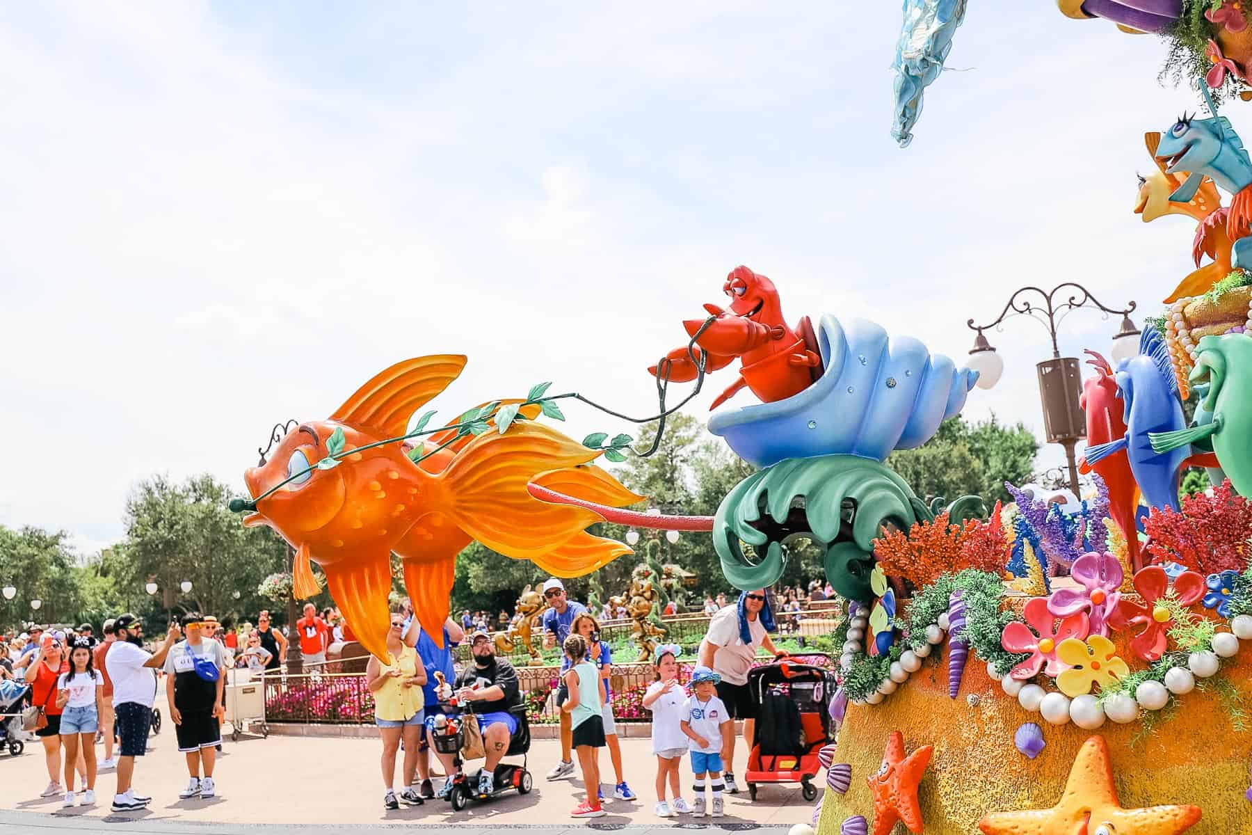 Sebastian steers The Little Mermaid float in the parade. 