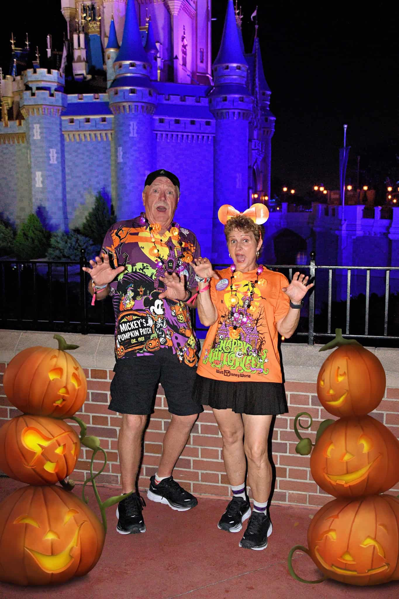 a side view of the castle with festive pumpkins 