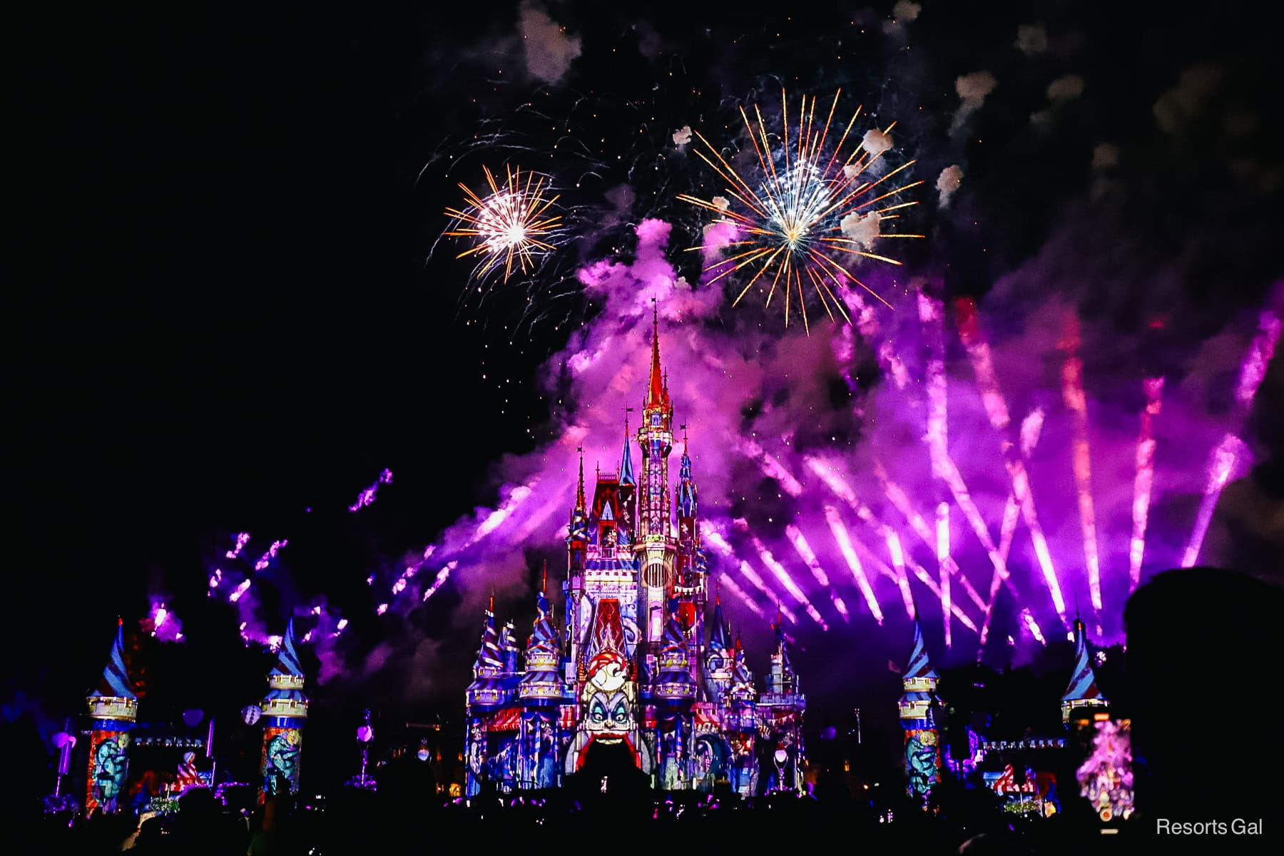 an Ursula projection on Cinderella Castle during Not So Spooky fireworks