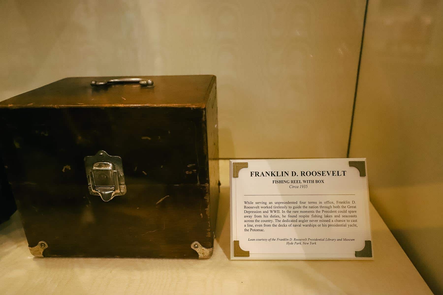 A fishing reel with box that belonged to Franklin D. Roosevelt. It is on display inside the Hall of Presidents. 